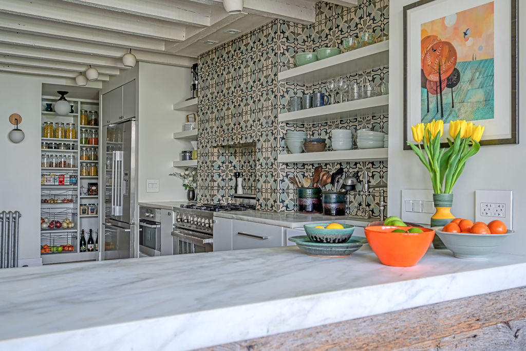 315 15th Street Brooklyn, NY 11215 - Photo 5 of 25 a kitchen with stainless steel appliances kitchen island granite countertop a refrigerator and wooden floor