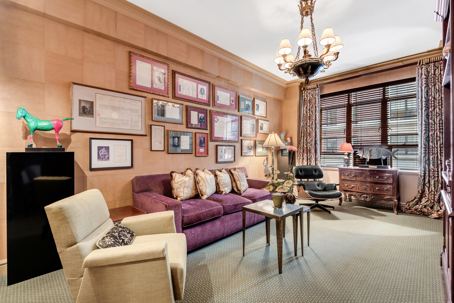 115 Central Park West, Unit 3B Manhattan, NY 10023 - Photo 9 of 20 a living room with furniture and a chandelier