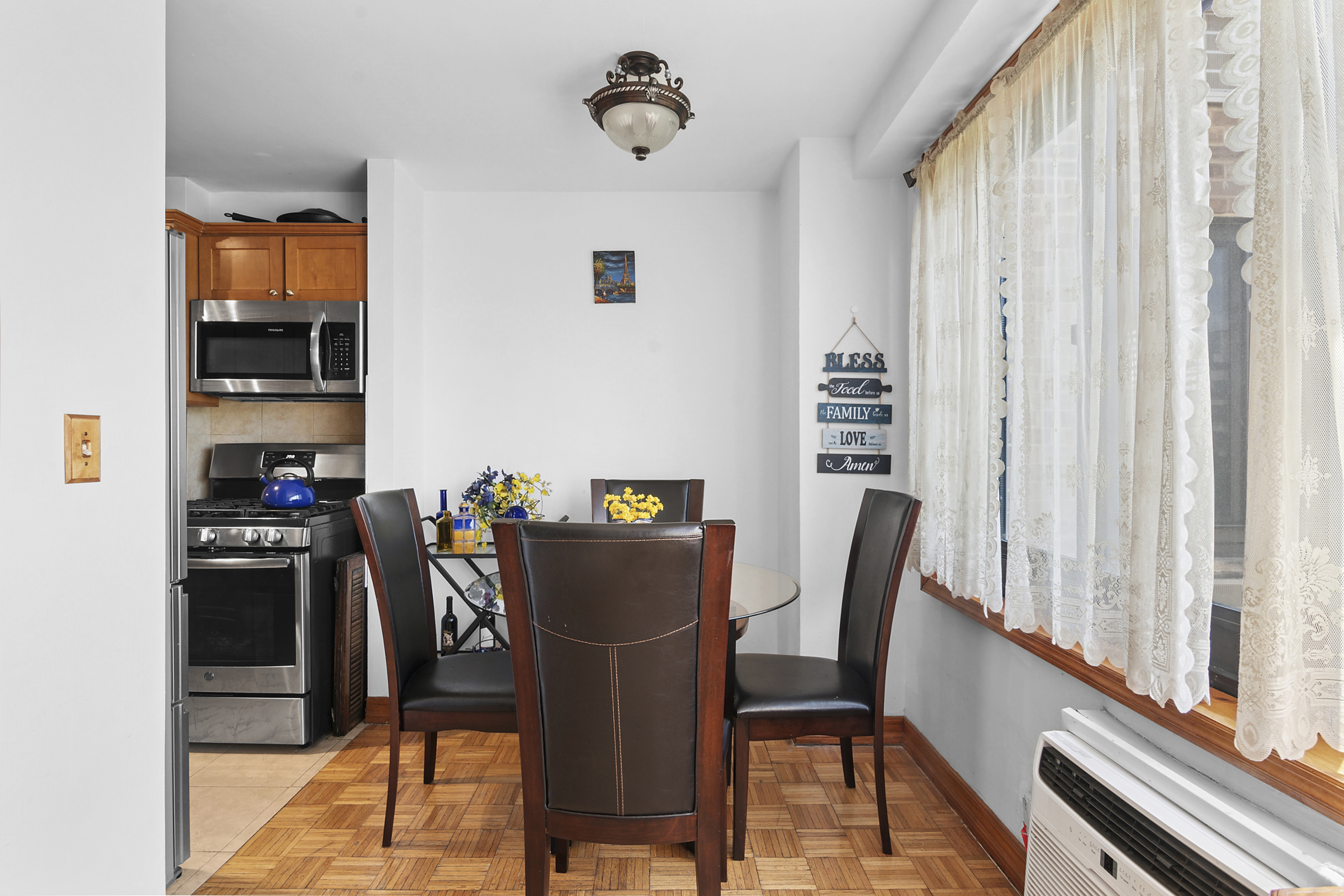195 Willoughby Avenue, Unit 518 Brooklyn, NY 11205 - Photo 4 of 7 a view of a dining room with furniture window and outside view