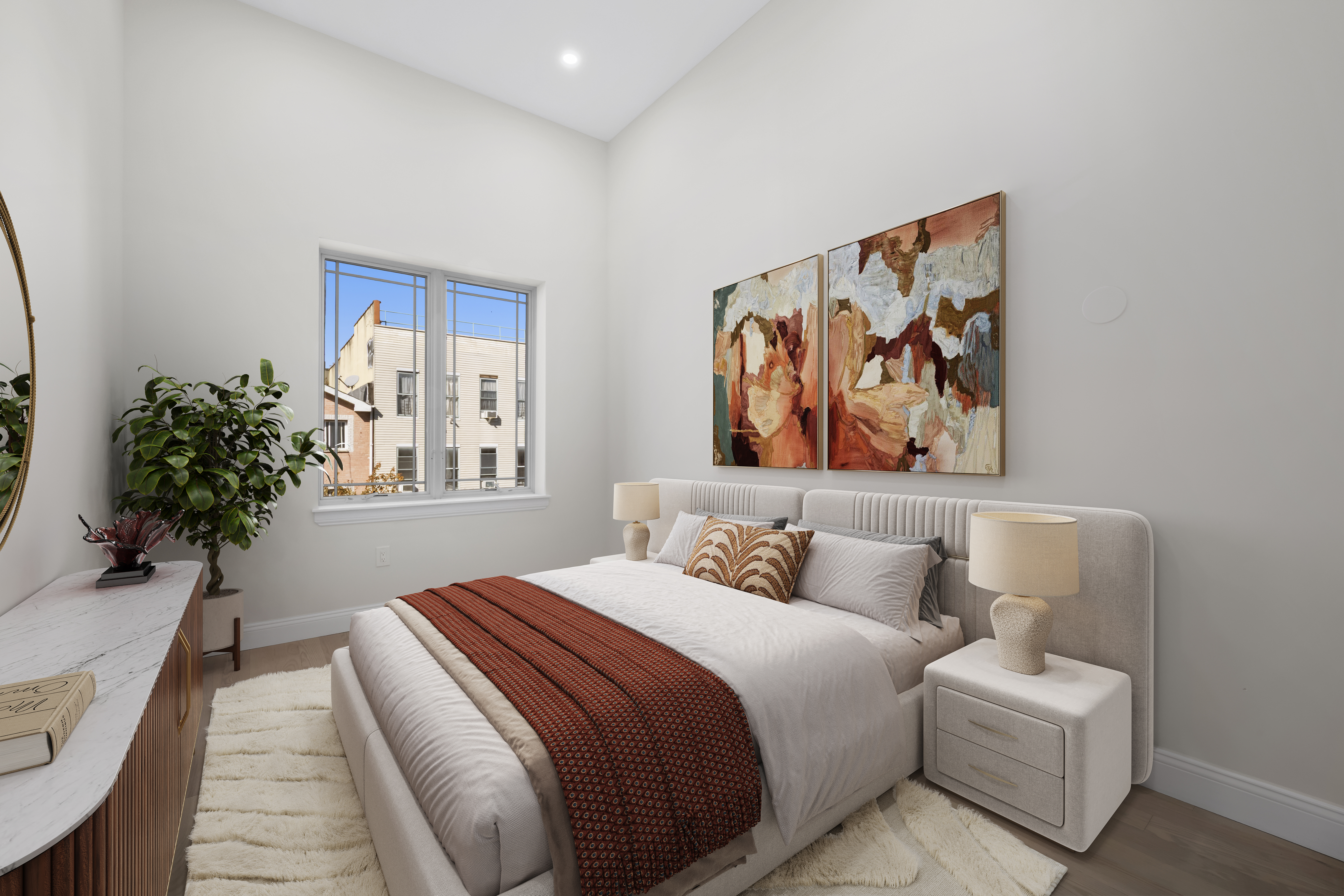 84 Himrod Street Brooklyn, NY 11221 - Photo 18 of 35 a bedroom with furniture and a potted plant