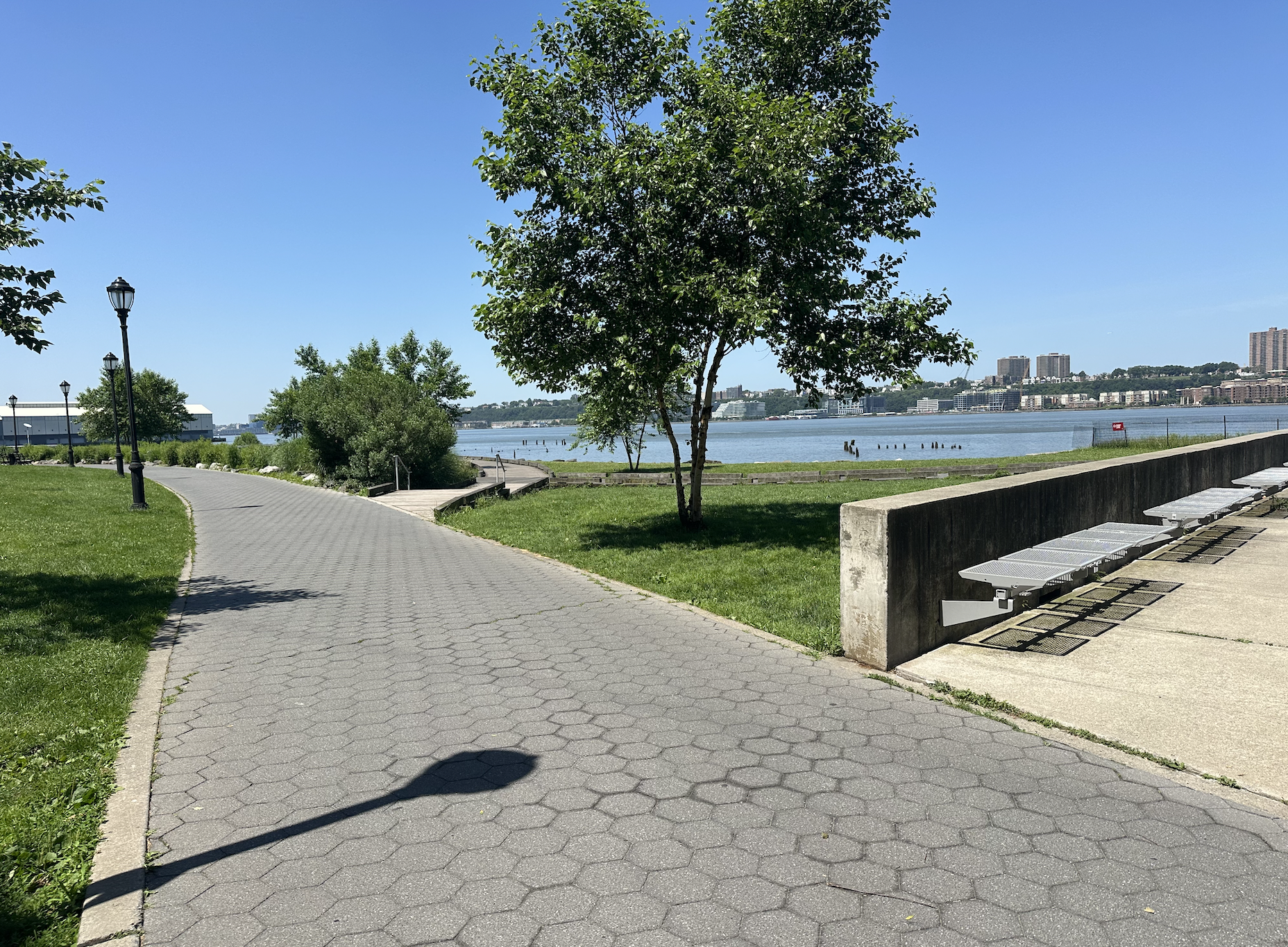 345 West 70th Street, Unit 5E Manhattan, NY 10023 - Photo 8 of 10 a view of a lake with a yard
