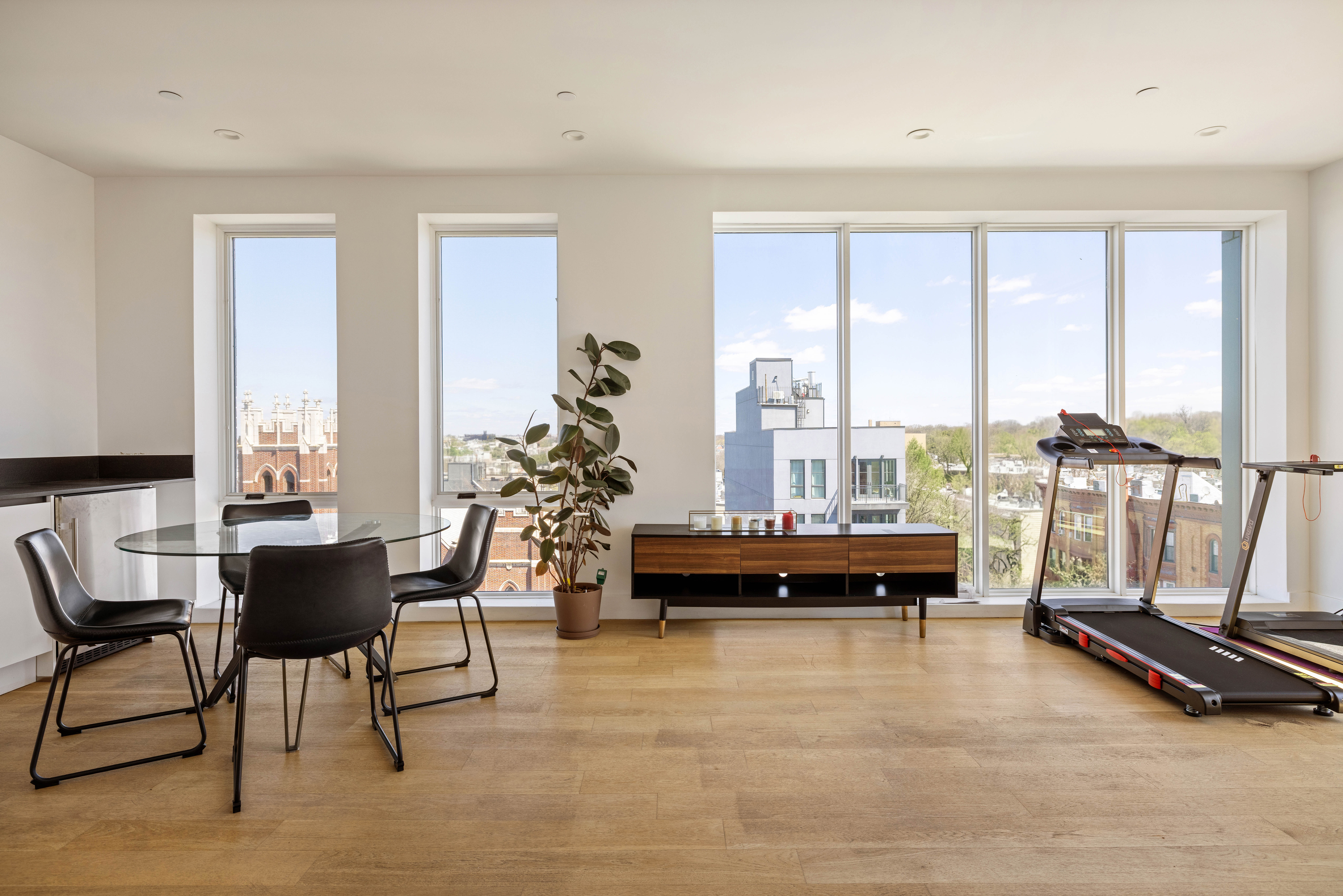 1404 Bushwick Avenue, Unit 1F Brooklyn, NY 11207 - Photo 15 of 18 a living room with furniture and floor to ceiling window