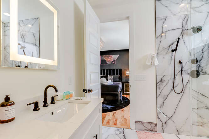 1203 Brick Church Pike Nashville, TN 37207 - Photo 19 of 44 a bathroom with a sink and a mirror