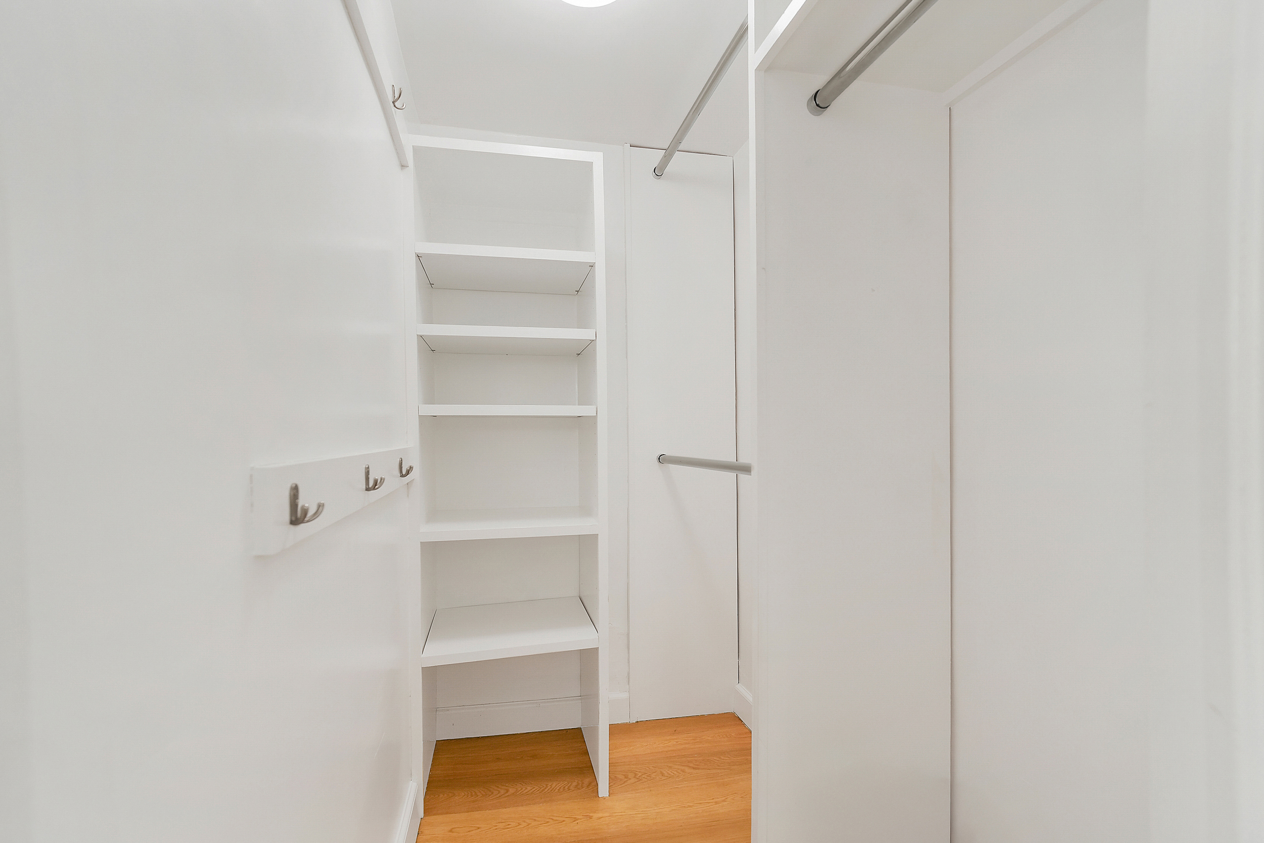102 West 85th Street, Unit 2B Manhattan, NY 10024 - Photo 10 of 16 a view of walk in closet with empty racks