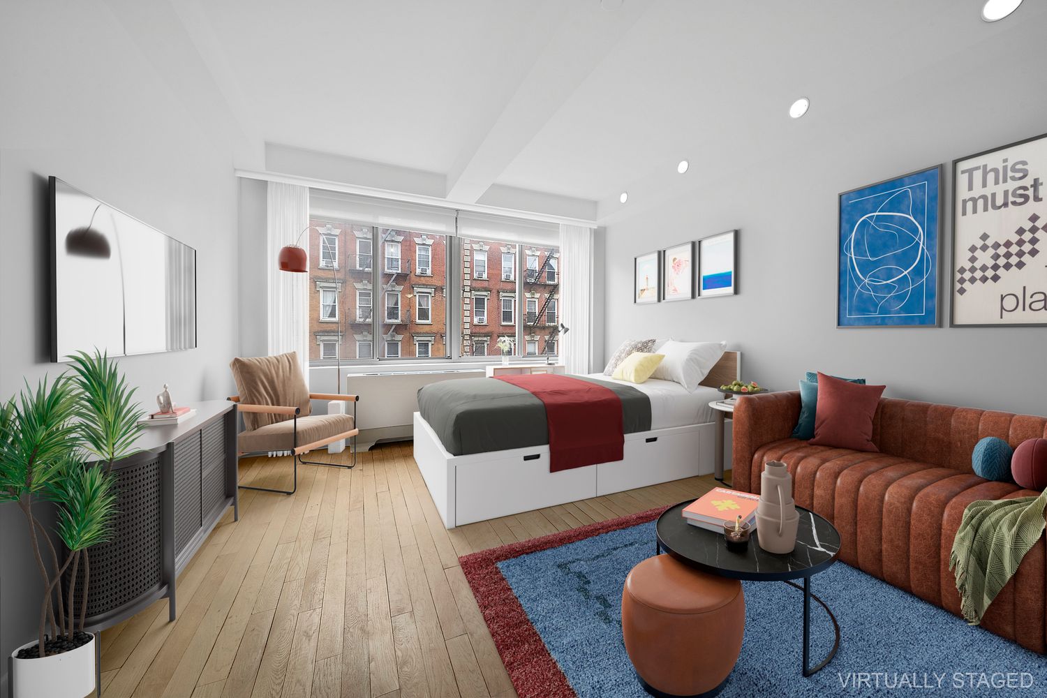 a living room with furniture and a rug