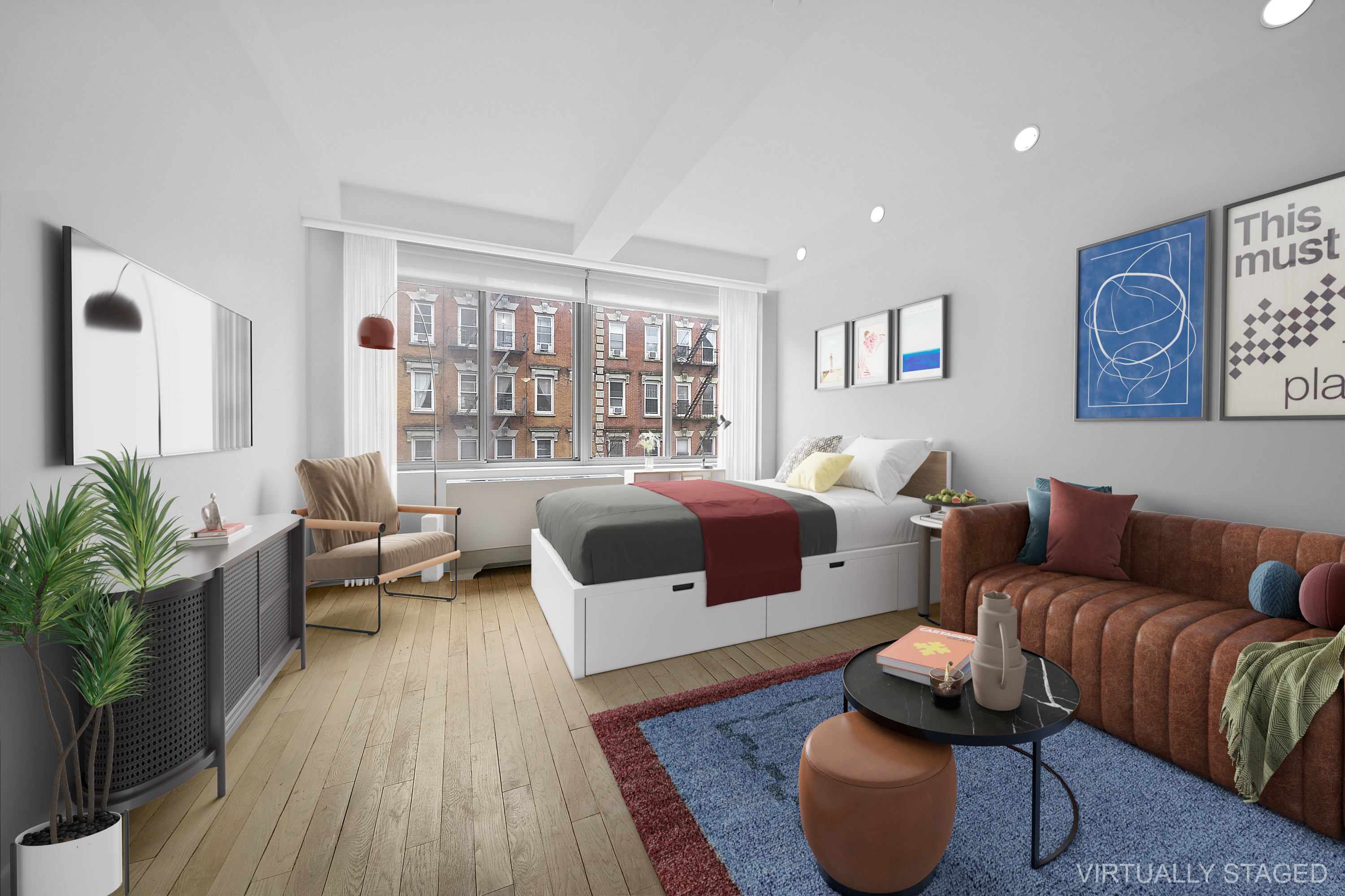 525 East 11th Street, Unit 4D Manhattan, NY 10009 - Photo 1 of 10 a living room with furniture and a rug
