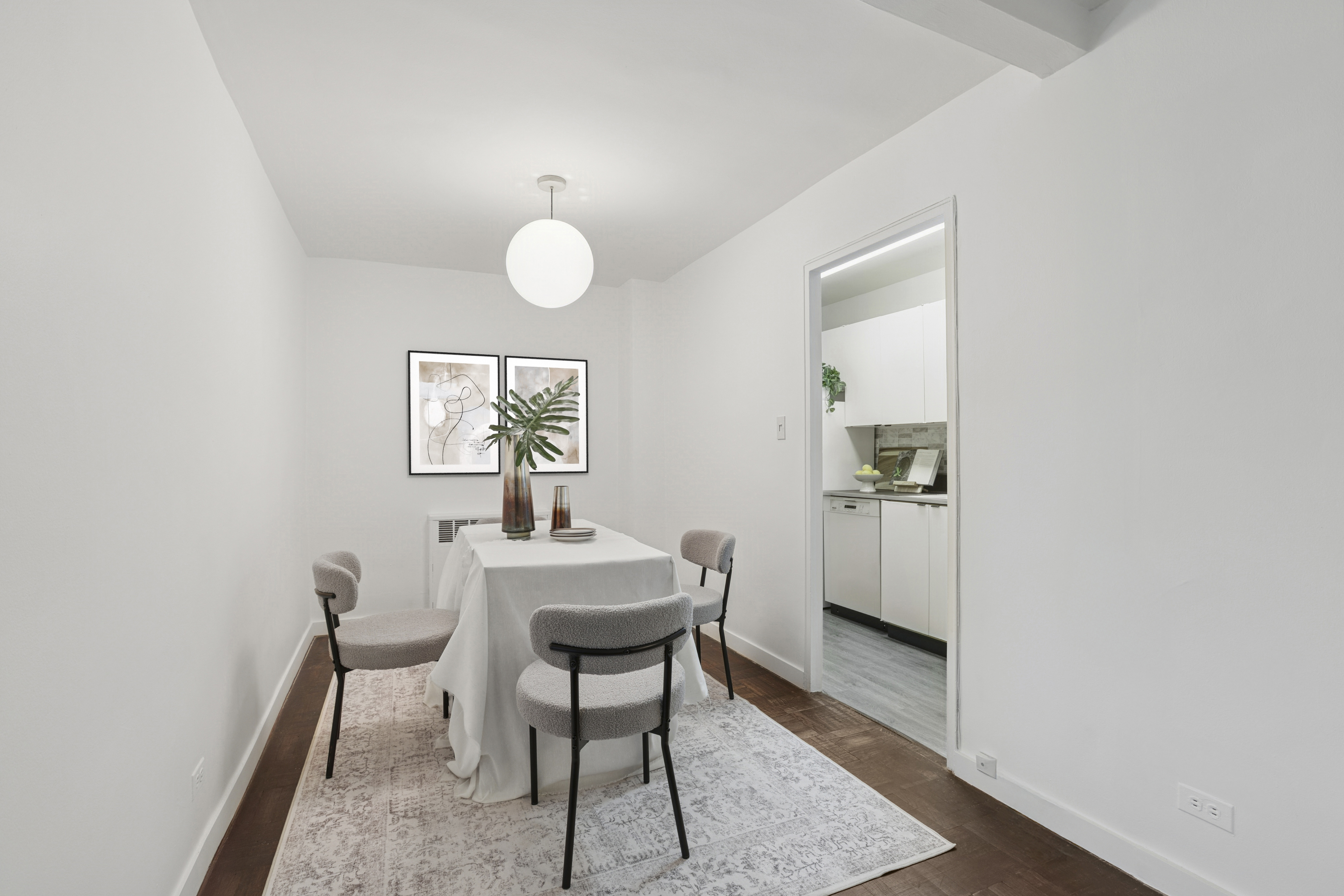 315 East 70th Street, Unit 7D Manhattan, NY 10021 - Photo 4 of 16 a view of a dining room with furniture and wooden floor