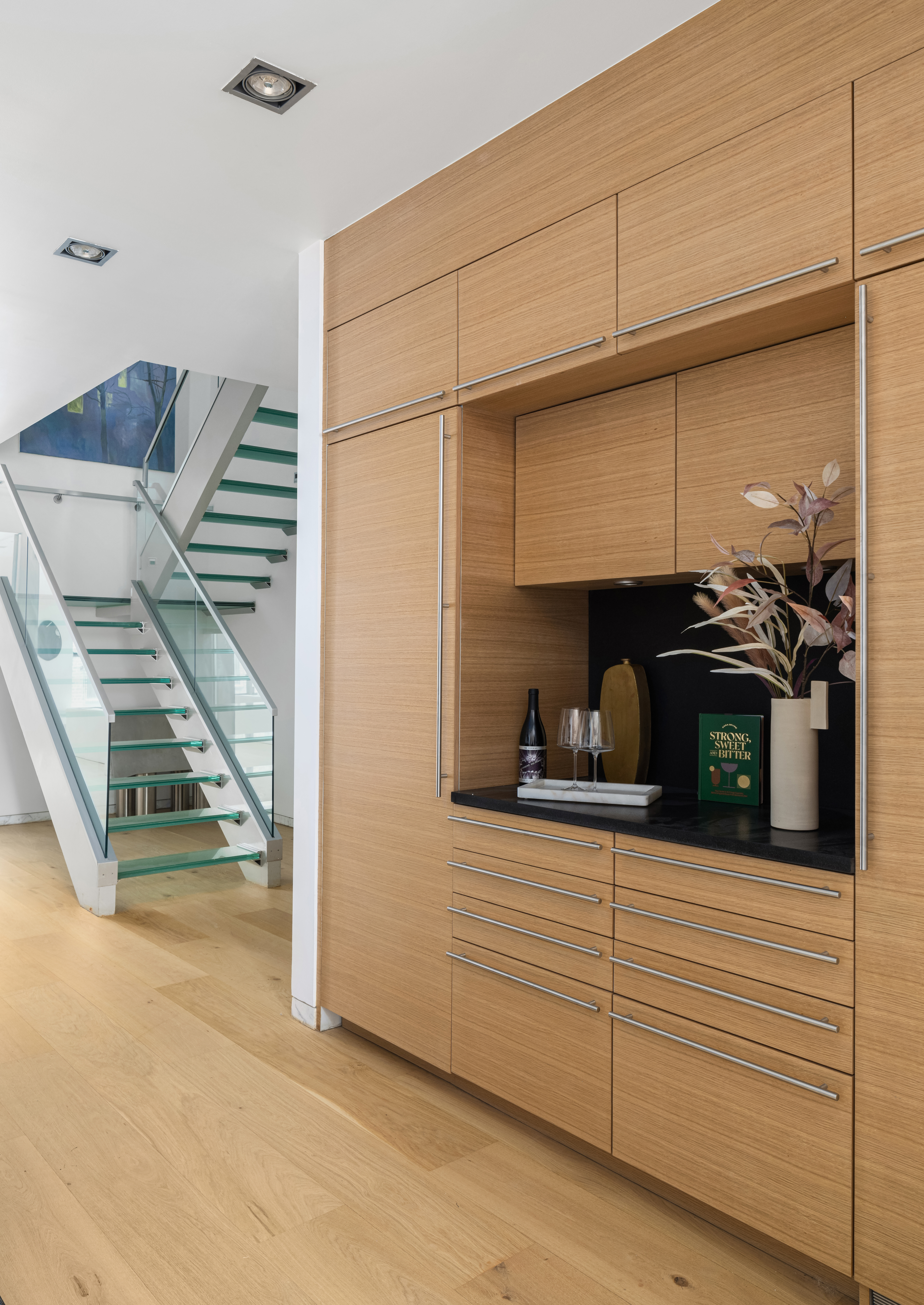 74 Warren Street, Unit 5W Manhattan, NY 10007 - Photo 7 of 15 a kitchen with stainless steel appliances granite countertop a stove and a sink