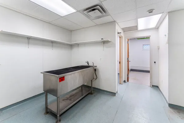 a view of a room with rack on the wall