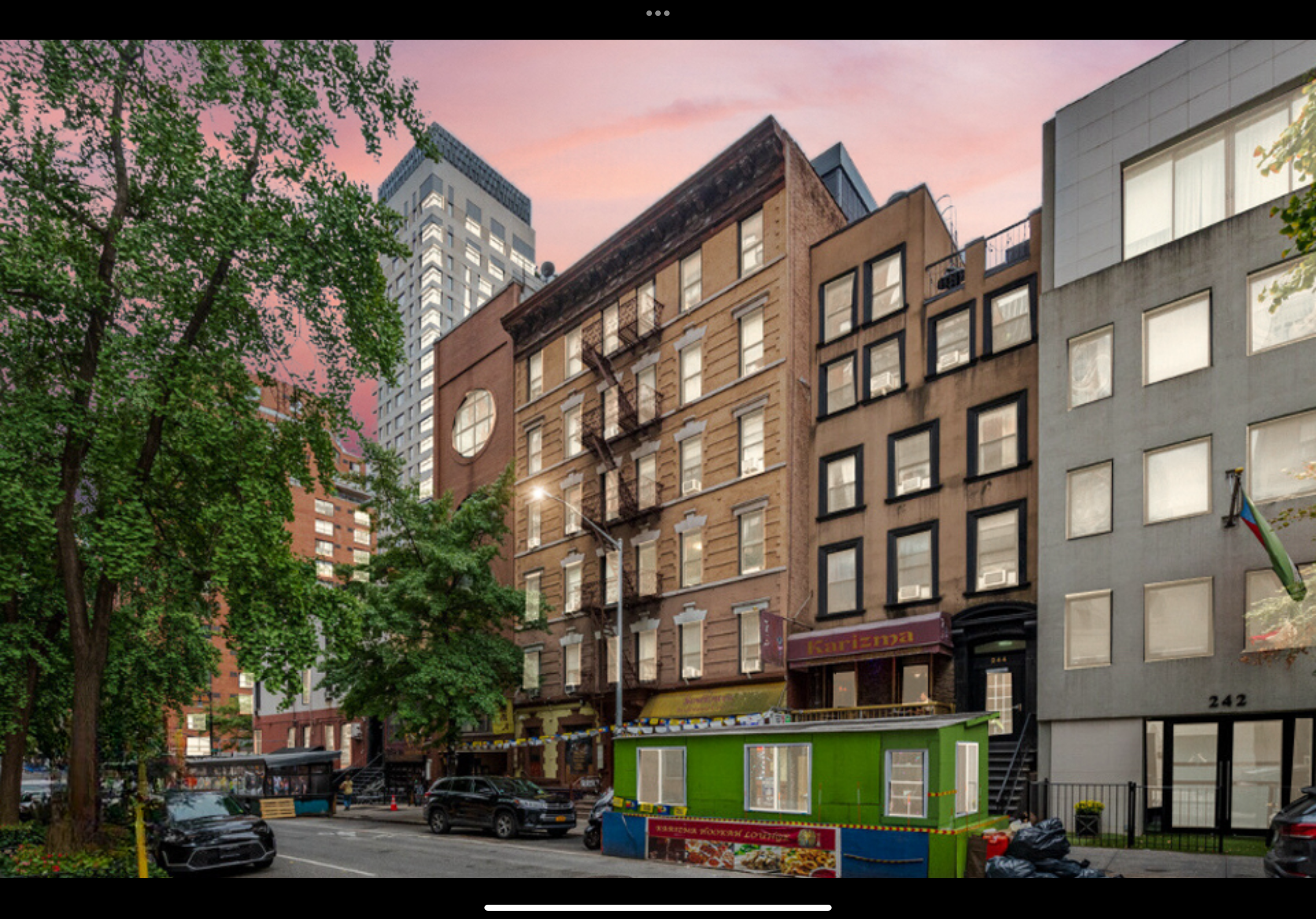 246 East 51st Street, Unit 22 Manhattan, NY 10022 - Photo 8 of 9 a front view of a building with street view