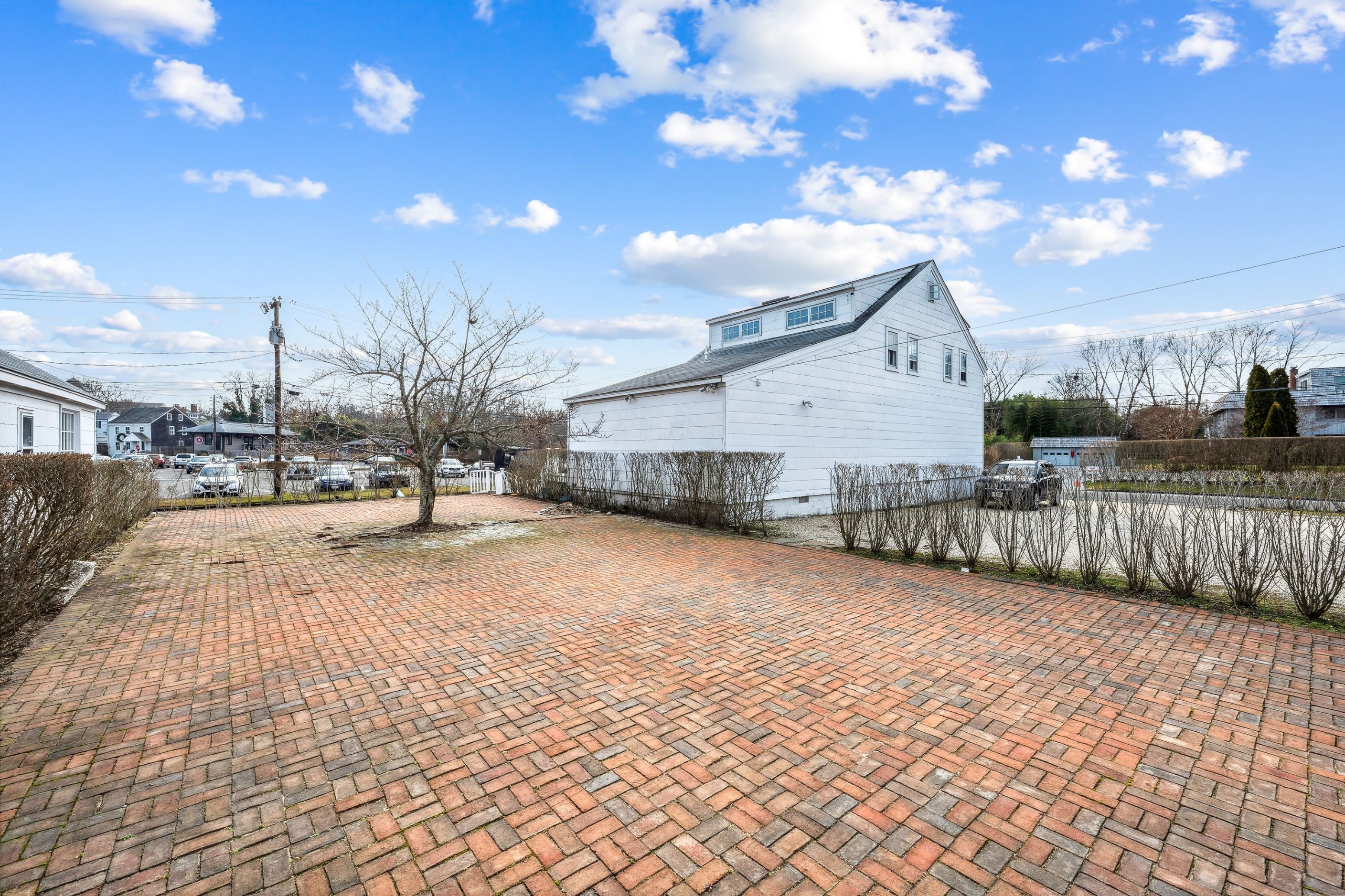 23 Bridge Street Sag Harbor, NY 11963 - Photo 25 of 25 a view of a yard with wooden fence