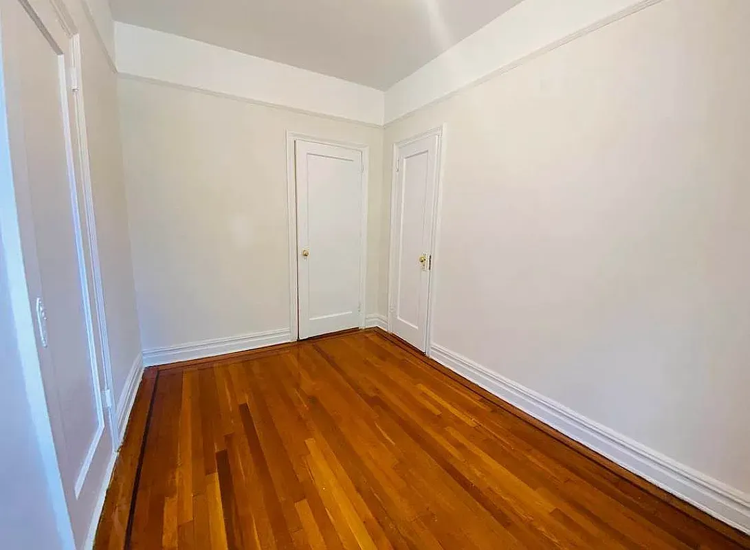 a view of small space with wooden floor