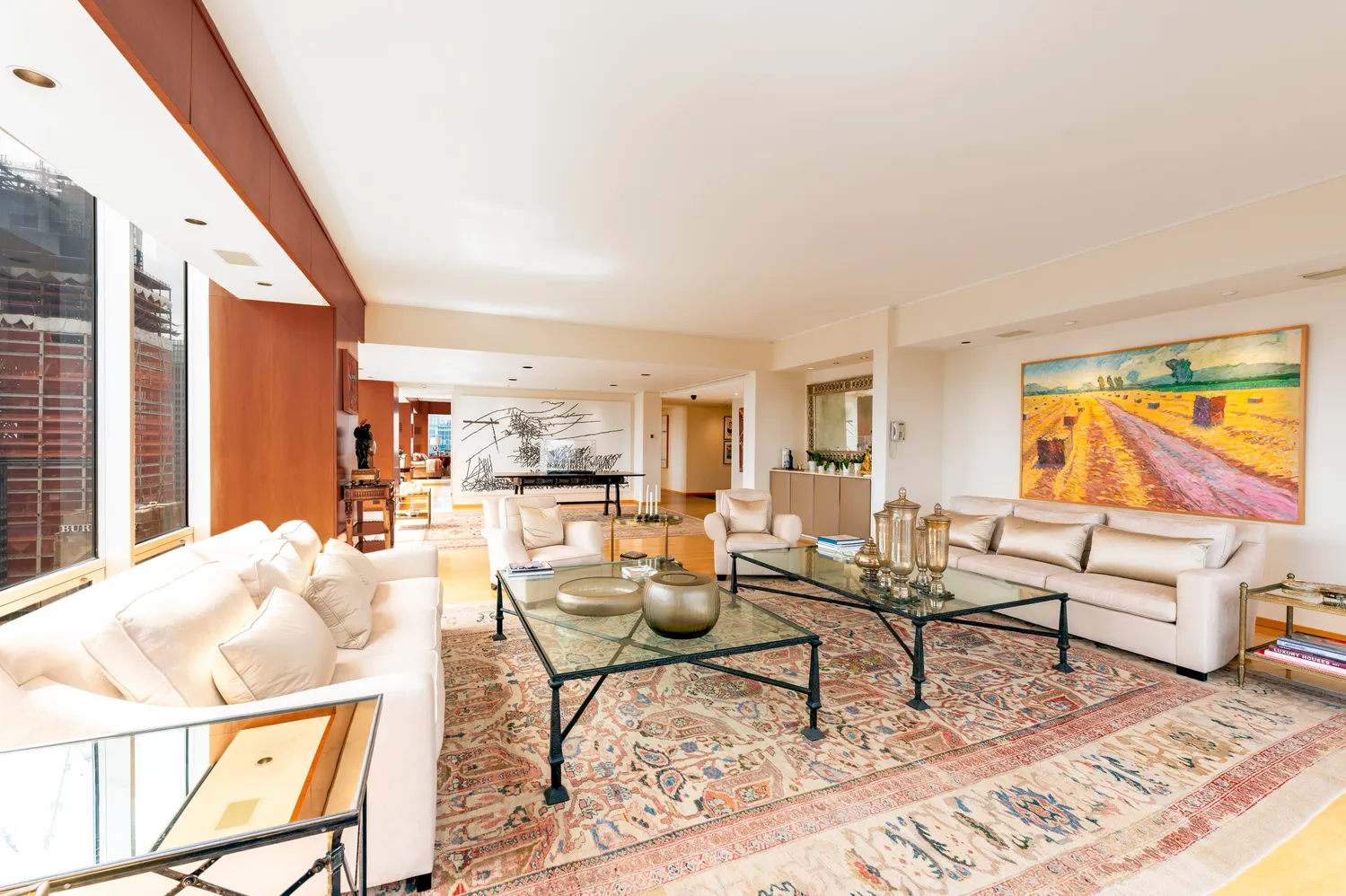 a bed room with a bed and a large window