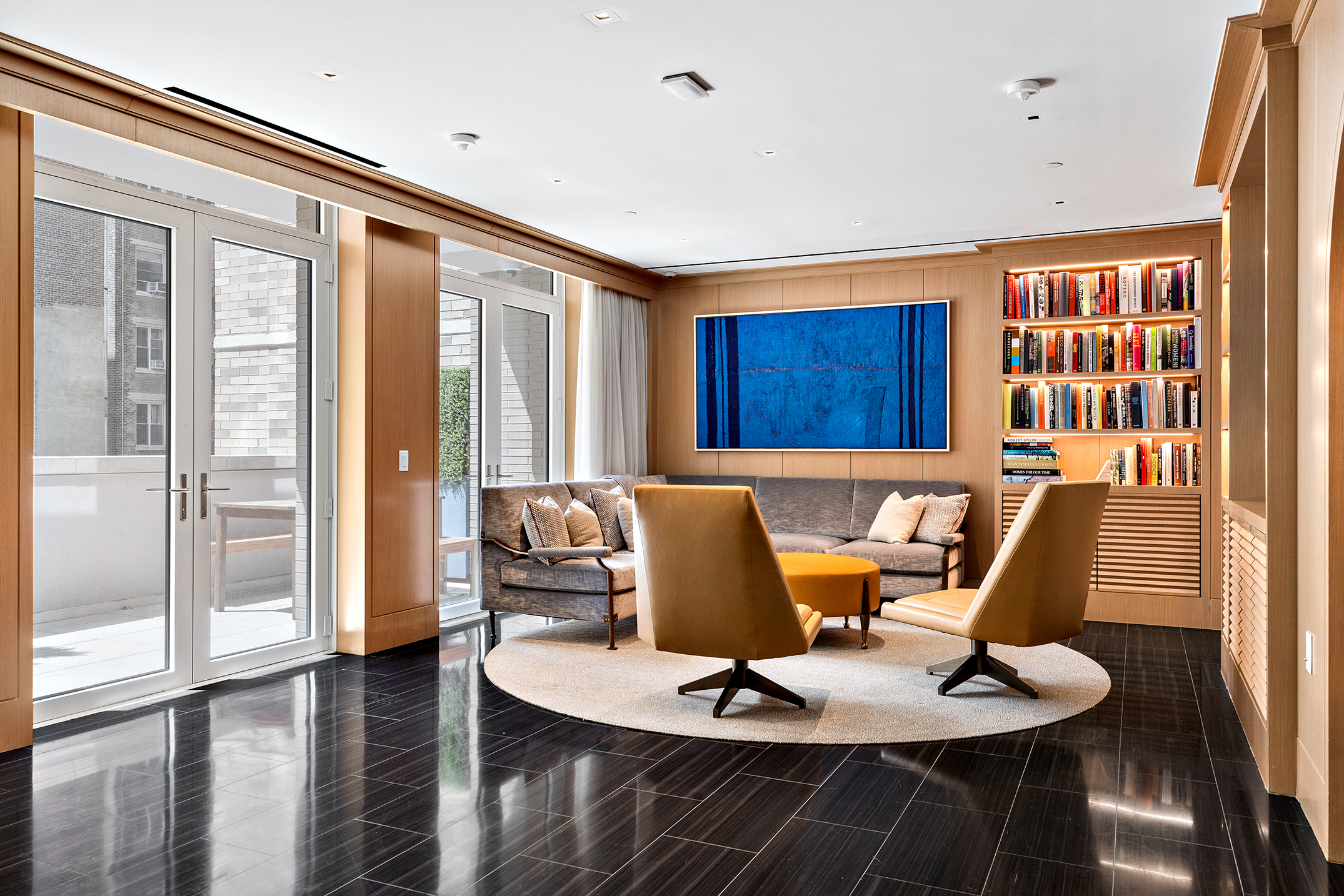 250 West 81st Street, Unit 8B Manhattan, NY 10024 - Photo 14 of 19 a living room with furniture and a floor to ceiling window