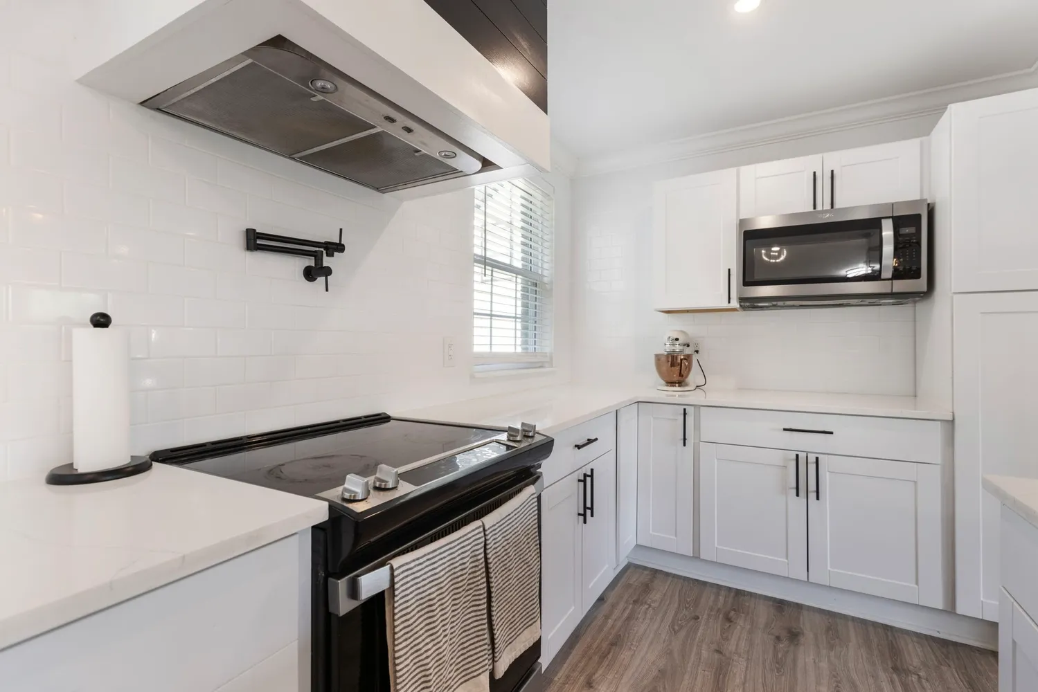 a bedroom with a bed and a fireplace