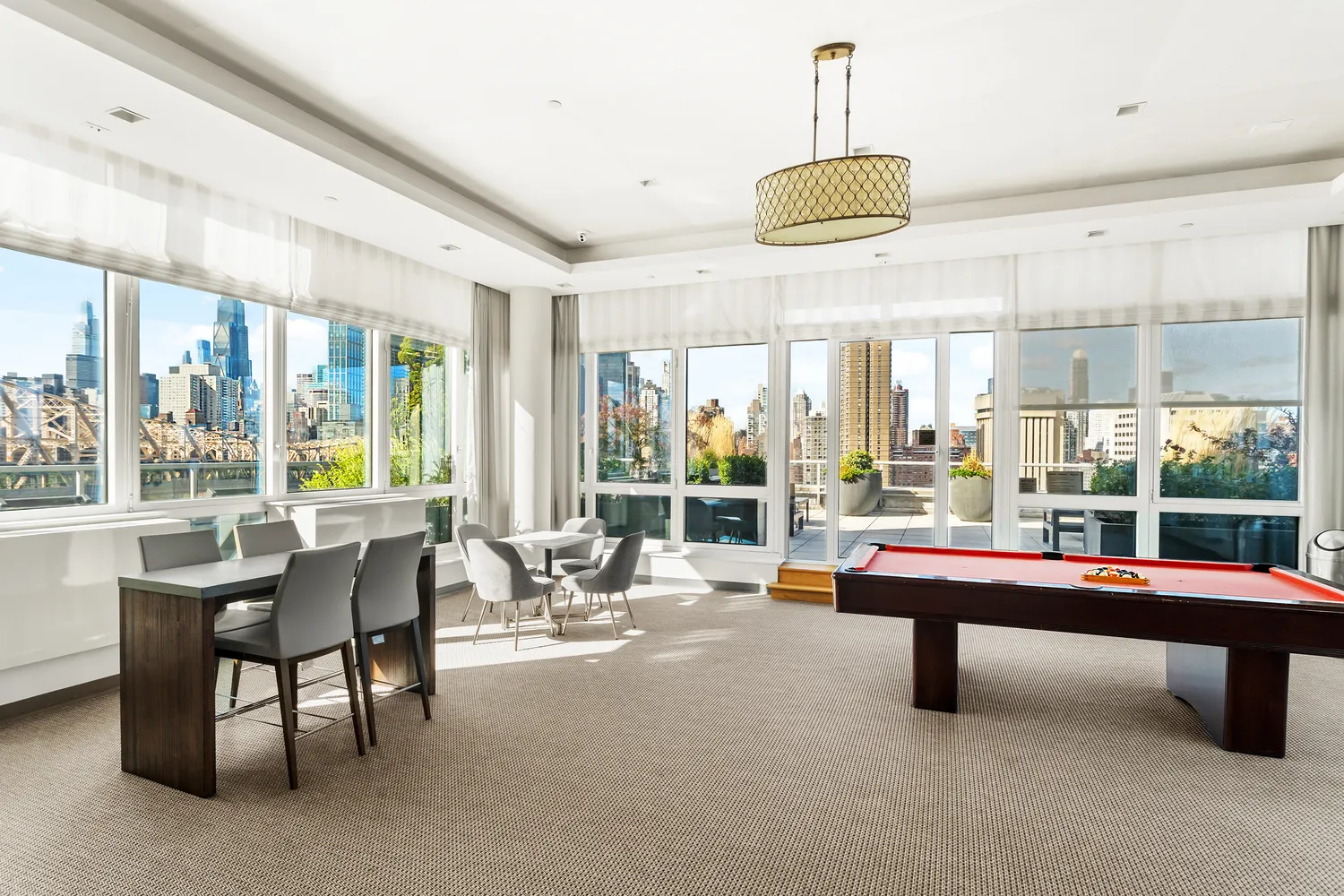 a room with lots of furniture and windows