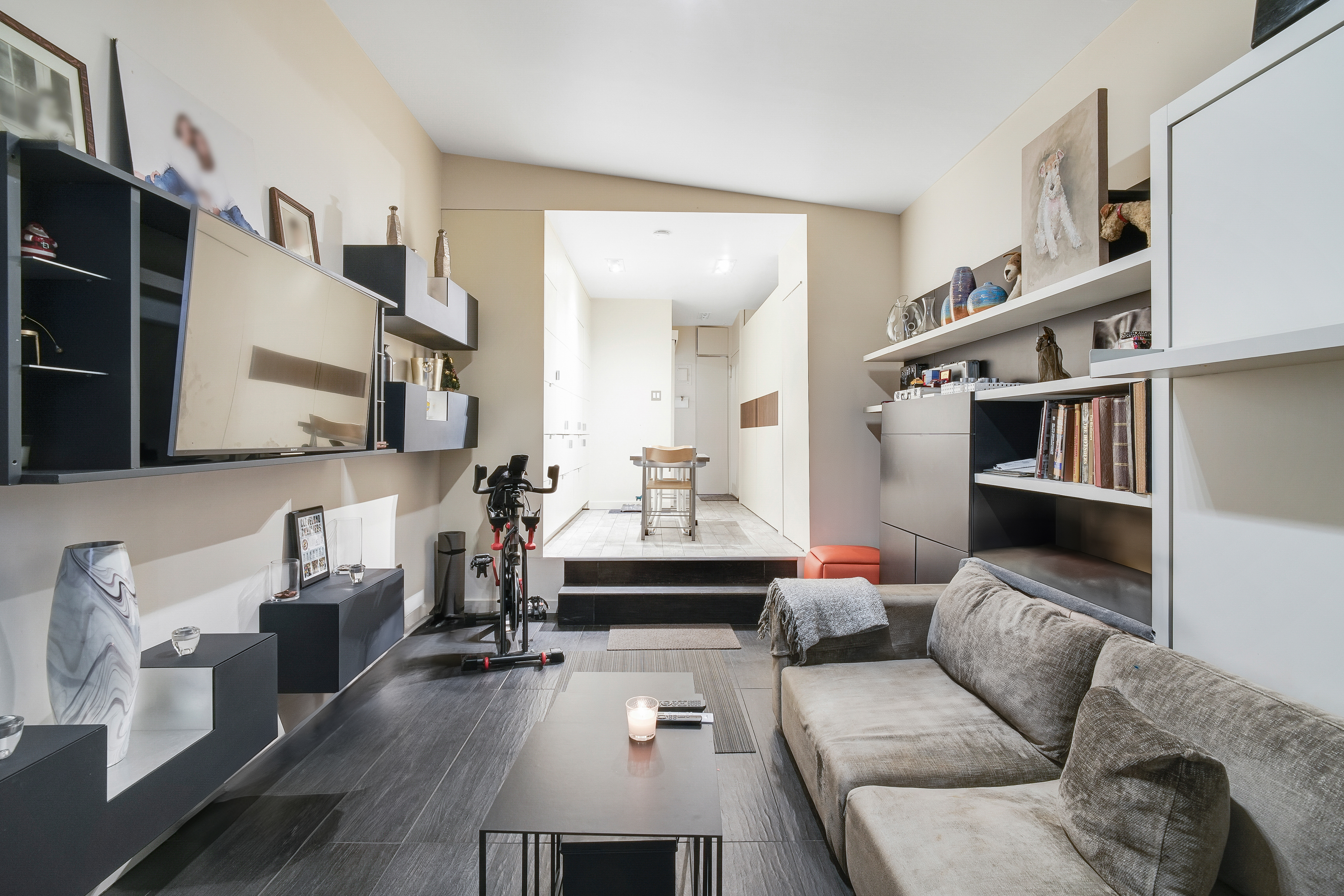 35 East 10th Street, Unit 3G Manhattan, NY 10003 - Photo 1 of 9 a living room with furniture and a wooden floor