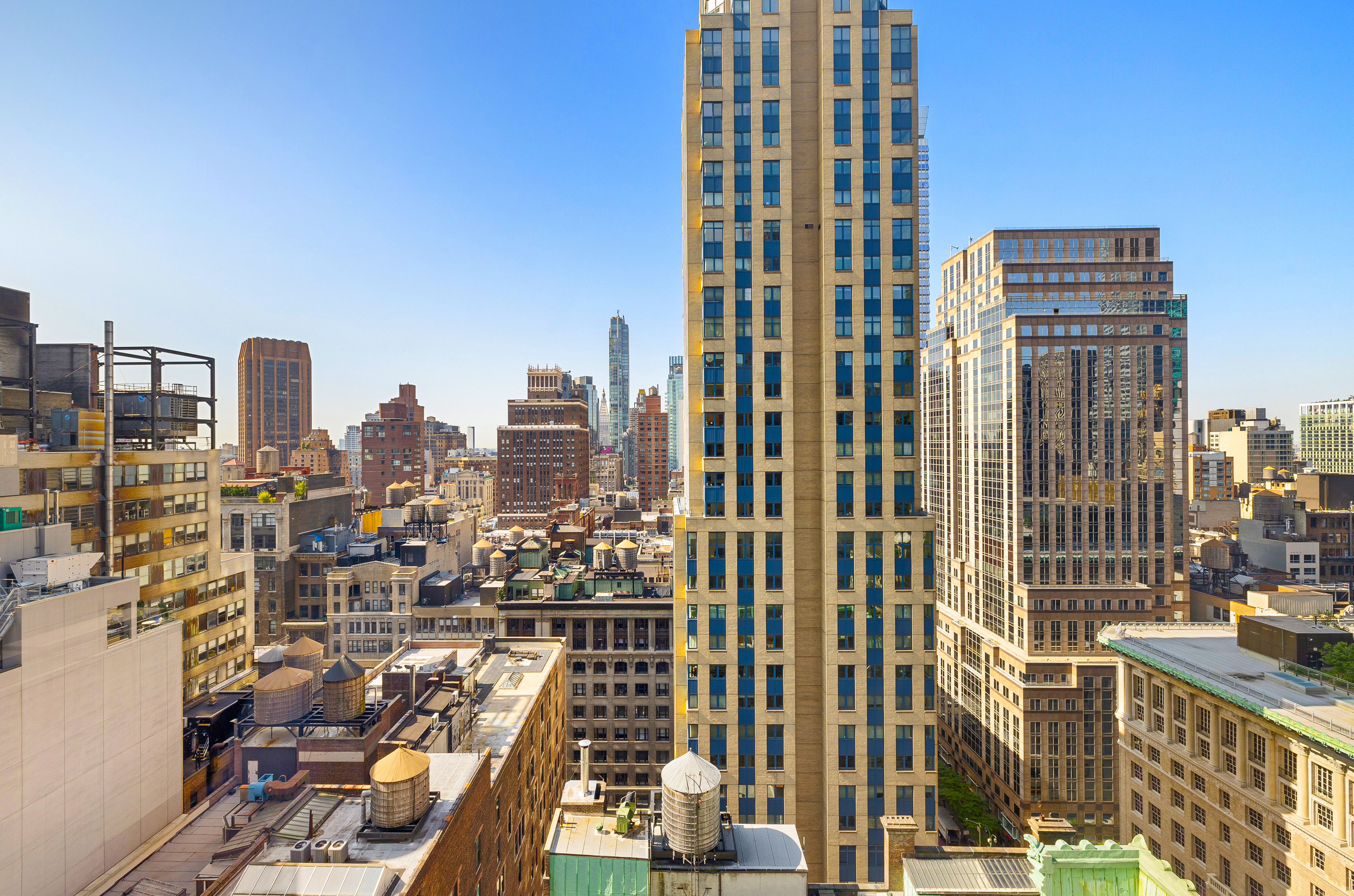 445 5th Avenue, Unit 26F Manhattan, NY 10016 - Photo 8 of 11 a view of a city with tall buildings