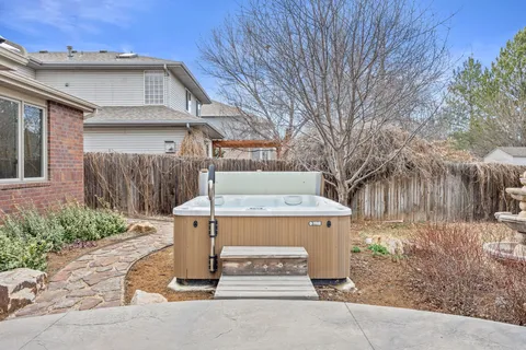 front view of a house with a garden