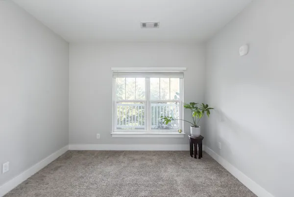 an empty room with windows