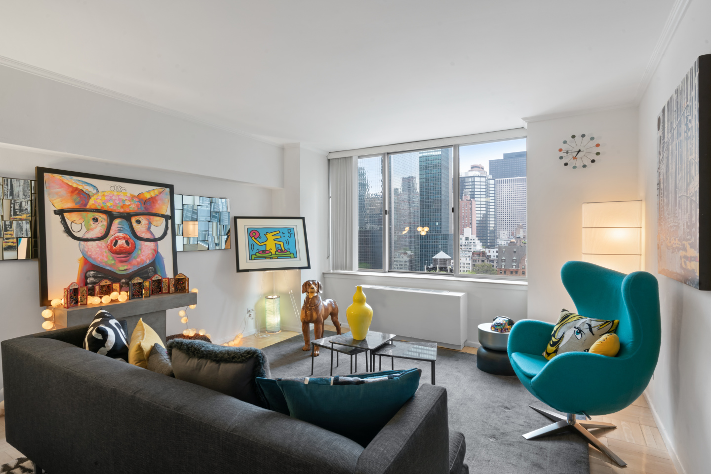236 East 47th Street, Unit 15E Manhattan, NY 10017 - Photo 4 of 11 a living room with furniture and a window