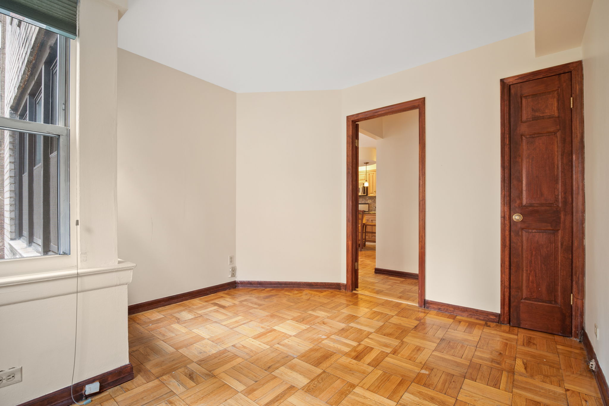 155 East 38th Street, Unit 5L Manhattan, NY 10016 - Photo 5 of 9 an empty room with closet