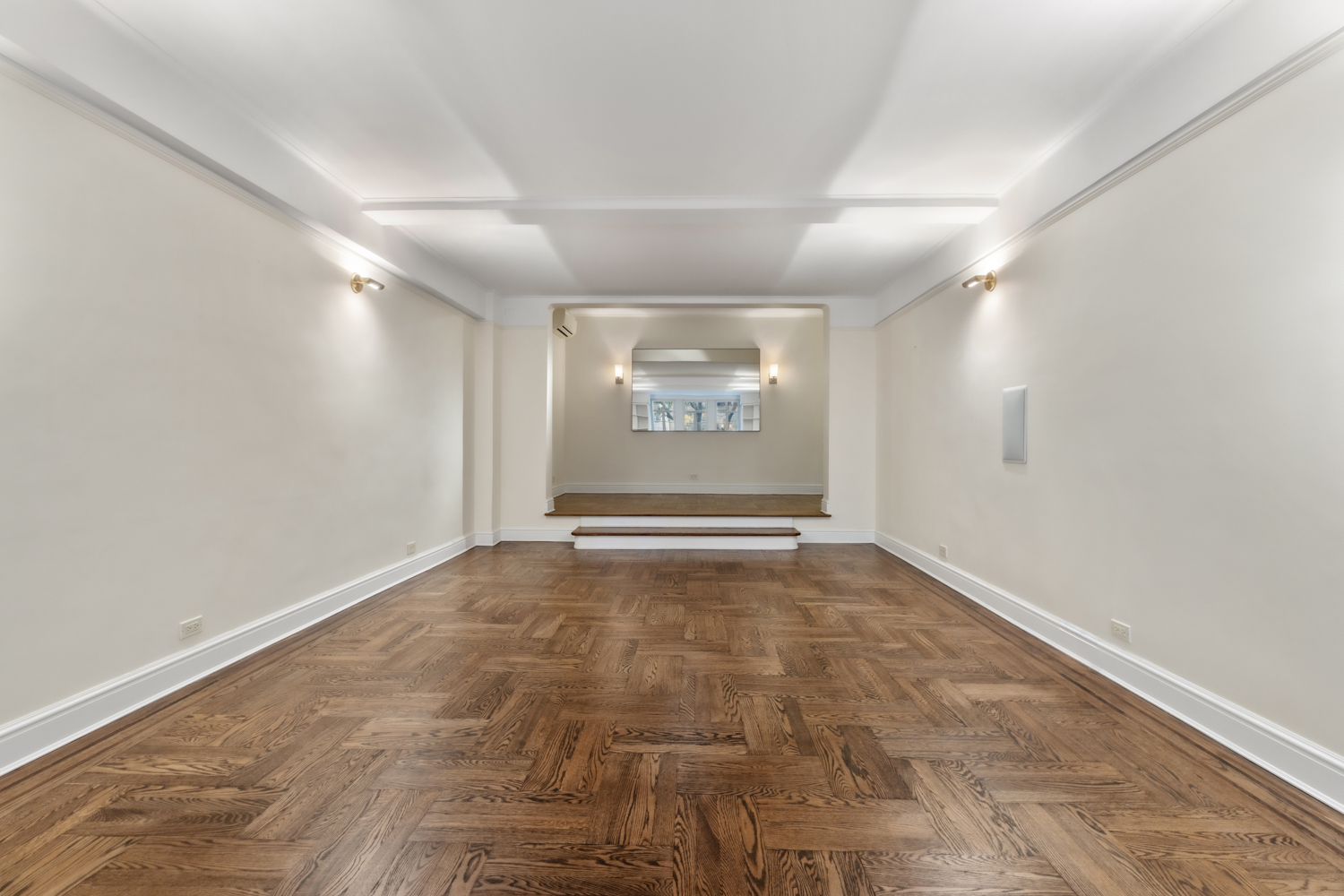 110 East 87th Street, Unit 2C Manhattan, NY 10128 - Photo 7 of 13 an empty room with a empty space and windows