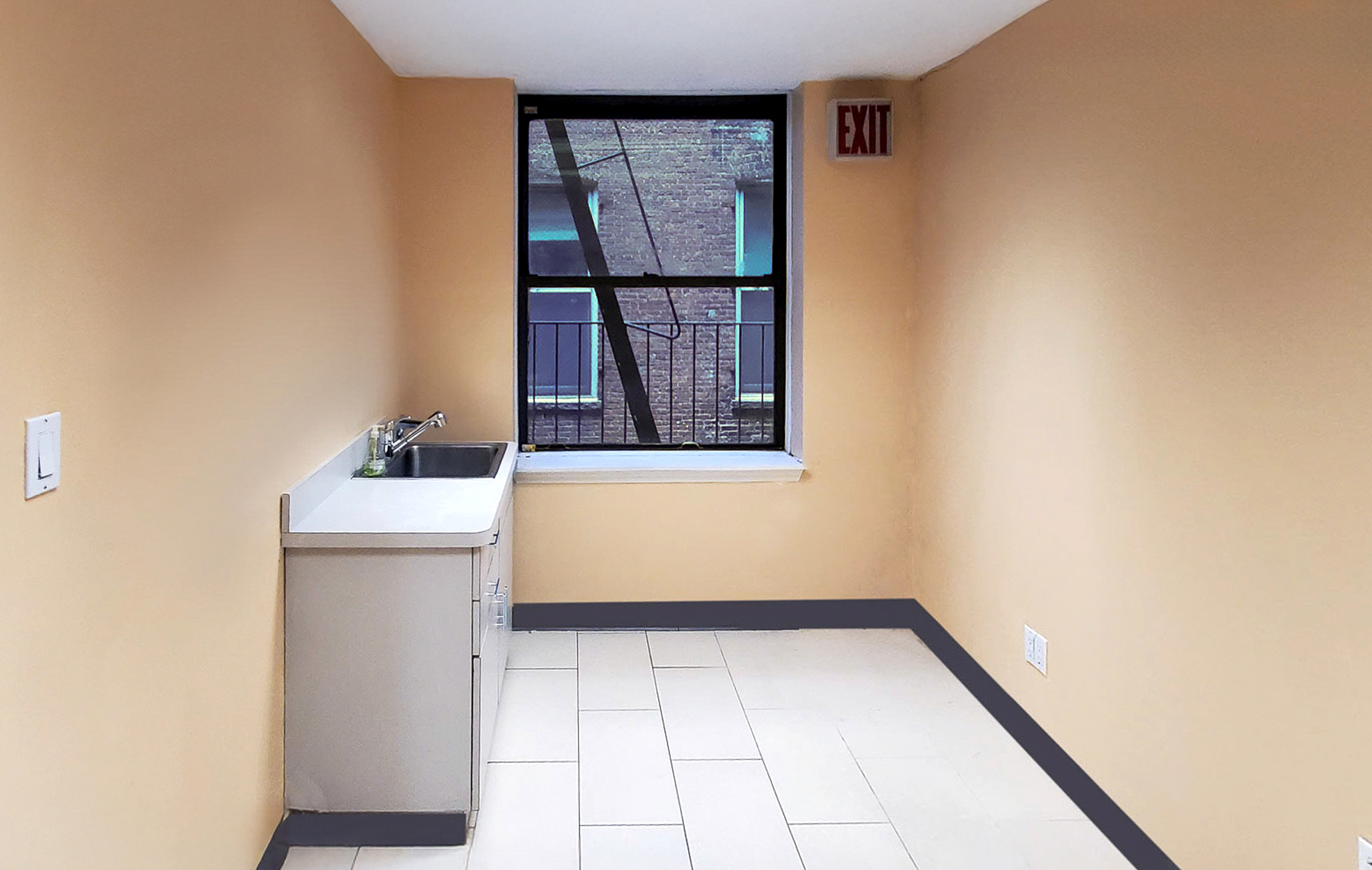 47 East 19th Street, Unit 4 Manhattan, NY 10003 - Photo 8 of 11 a view of room with window and bathroom