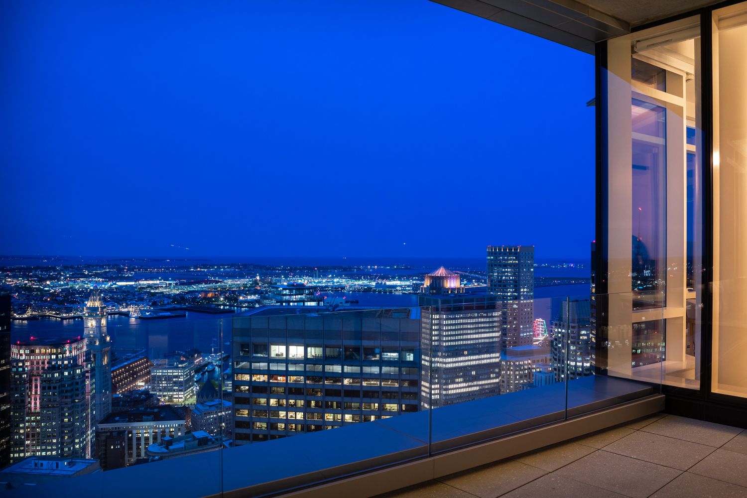 a view of a balcony with city view