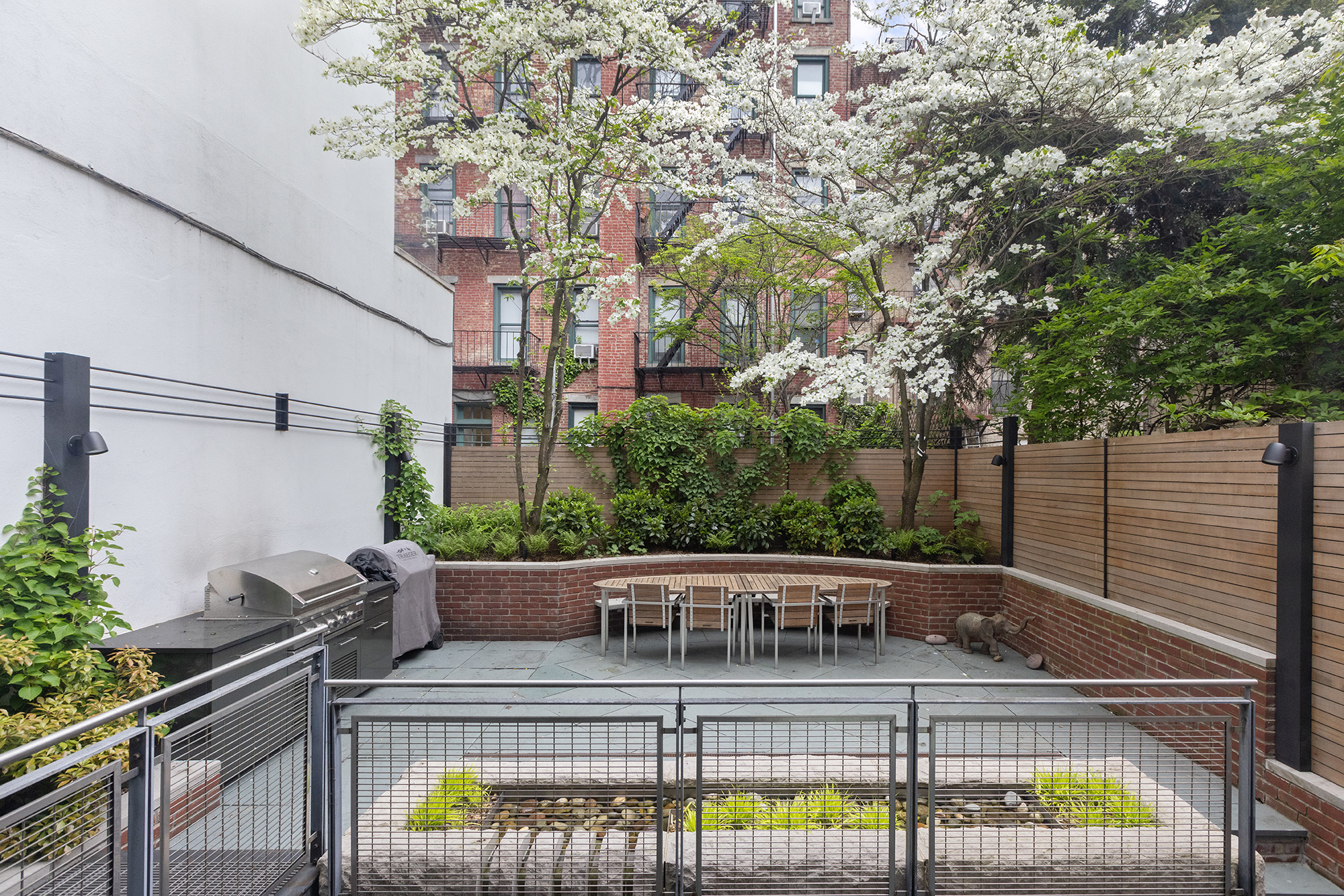 83 Jane Street Manhattan, NY 10014 - Photo 5 of 29 aerial view of a house with swimming pool