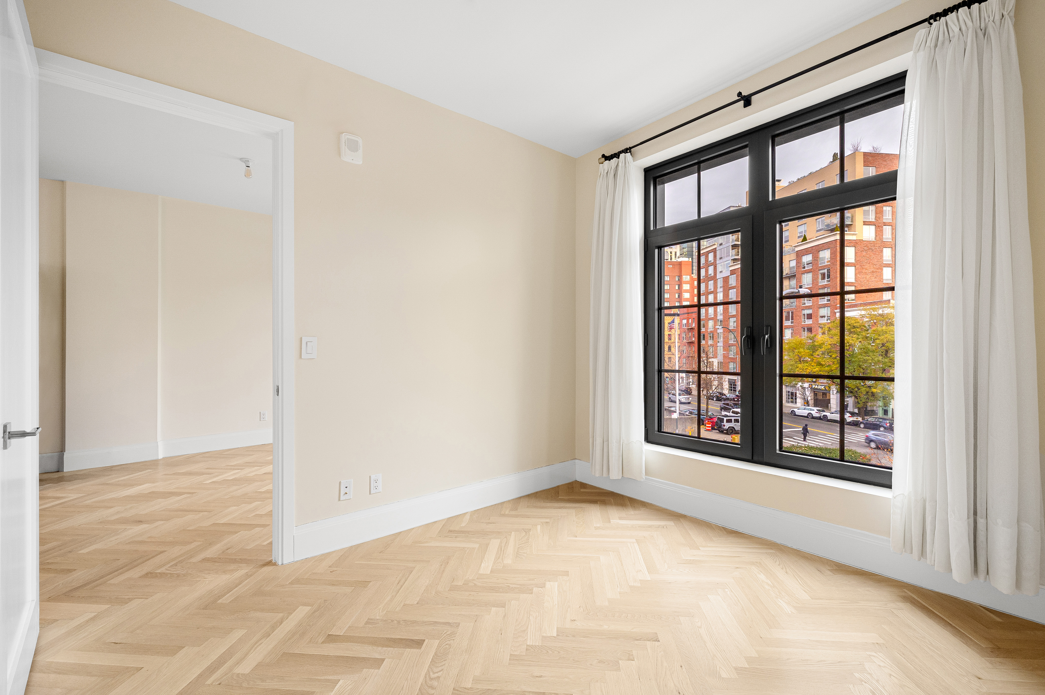300 West 122nd Street, Unit 4F Manhattan, NY 10027 - Photo 12 of 32 a view of an empty room with a window