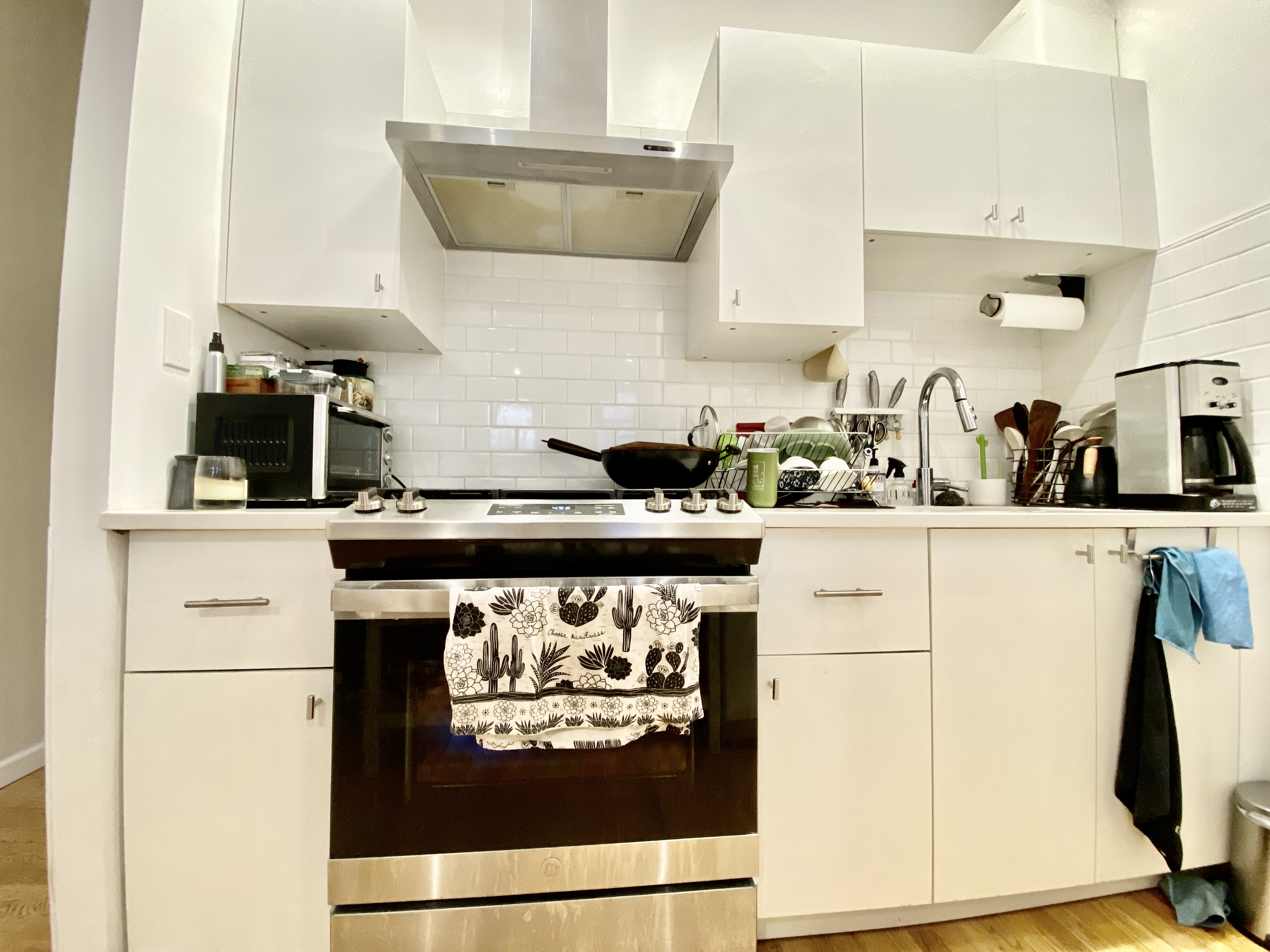 602 Madison Street, Unit 2 Brooklyn, NY 11221 - Photo 7 of 10 a kitchen with stainless steel appliances a stove and a refrigerator