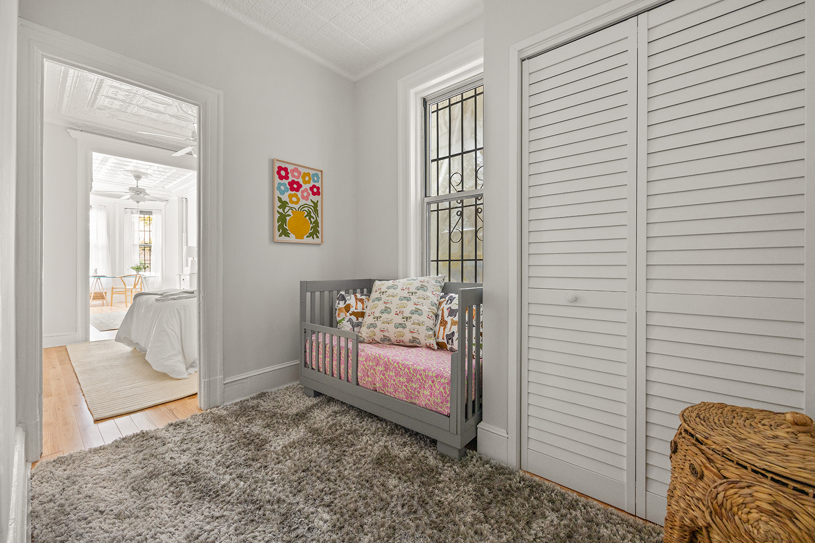 162 Garfield Place, Unit 1L Brooklyn, NY 11215 - Photo 8 of 13 a bedroom with a bed and a couch