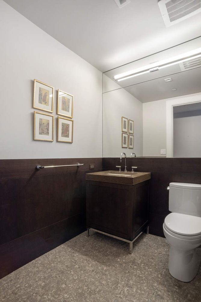 182 West 82nd Street, Unit 4E Manhattan, NY 10024 - Photo 10 of 25 a room with a sink and a toilet