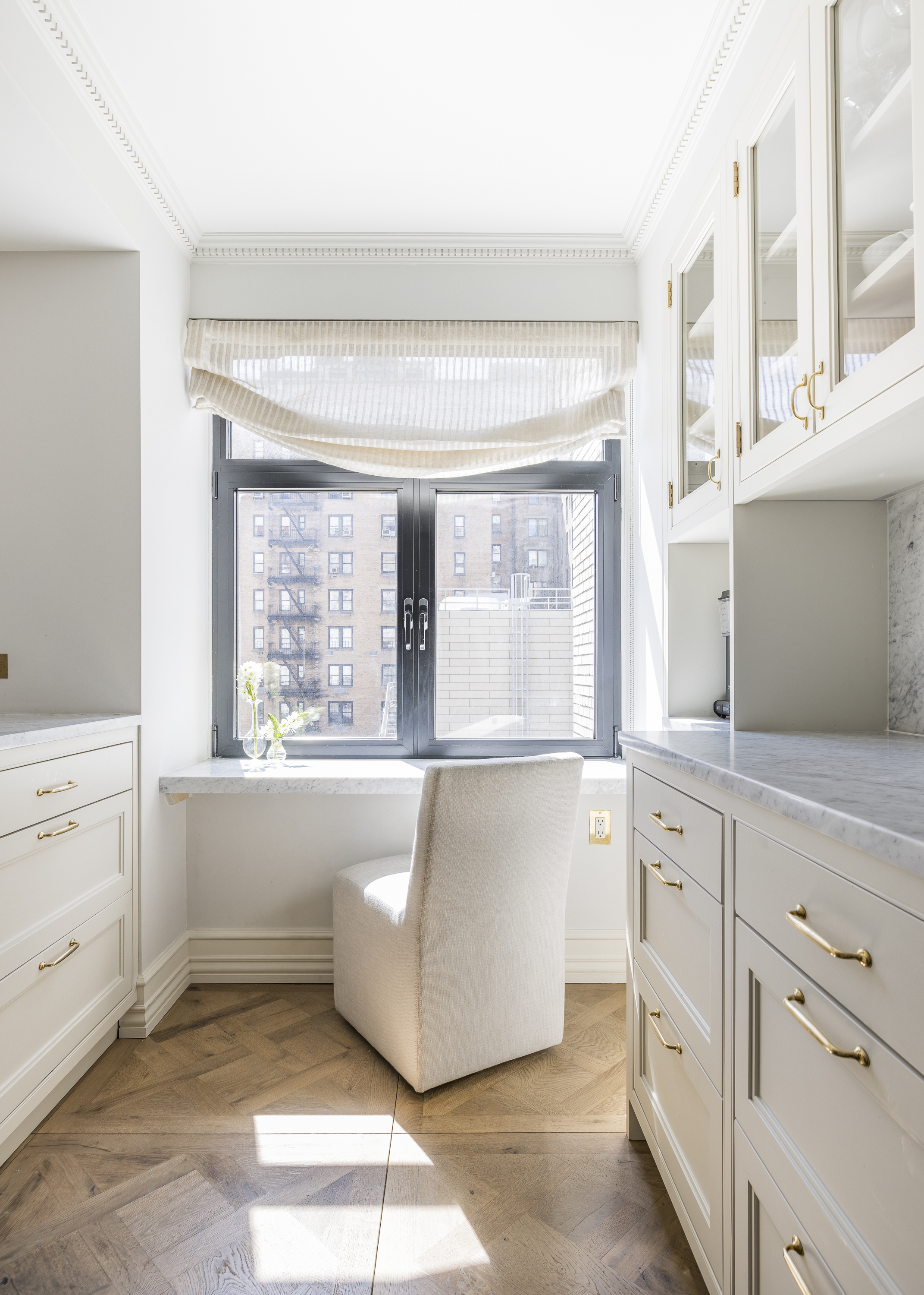 47 East 87th Street, Unit 7A Manhattan, NY 10128 - Photo 4 of 22 a living room with granite countertop furniture and a fireplace