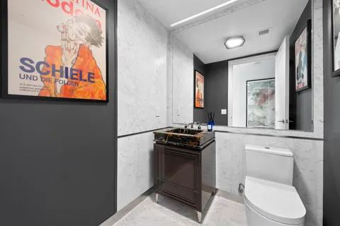 a kitchen with stainless steel appliances a stove and a refrigerator