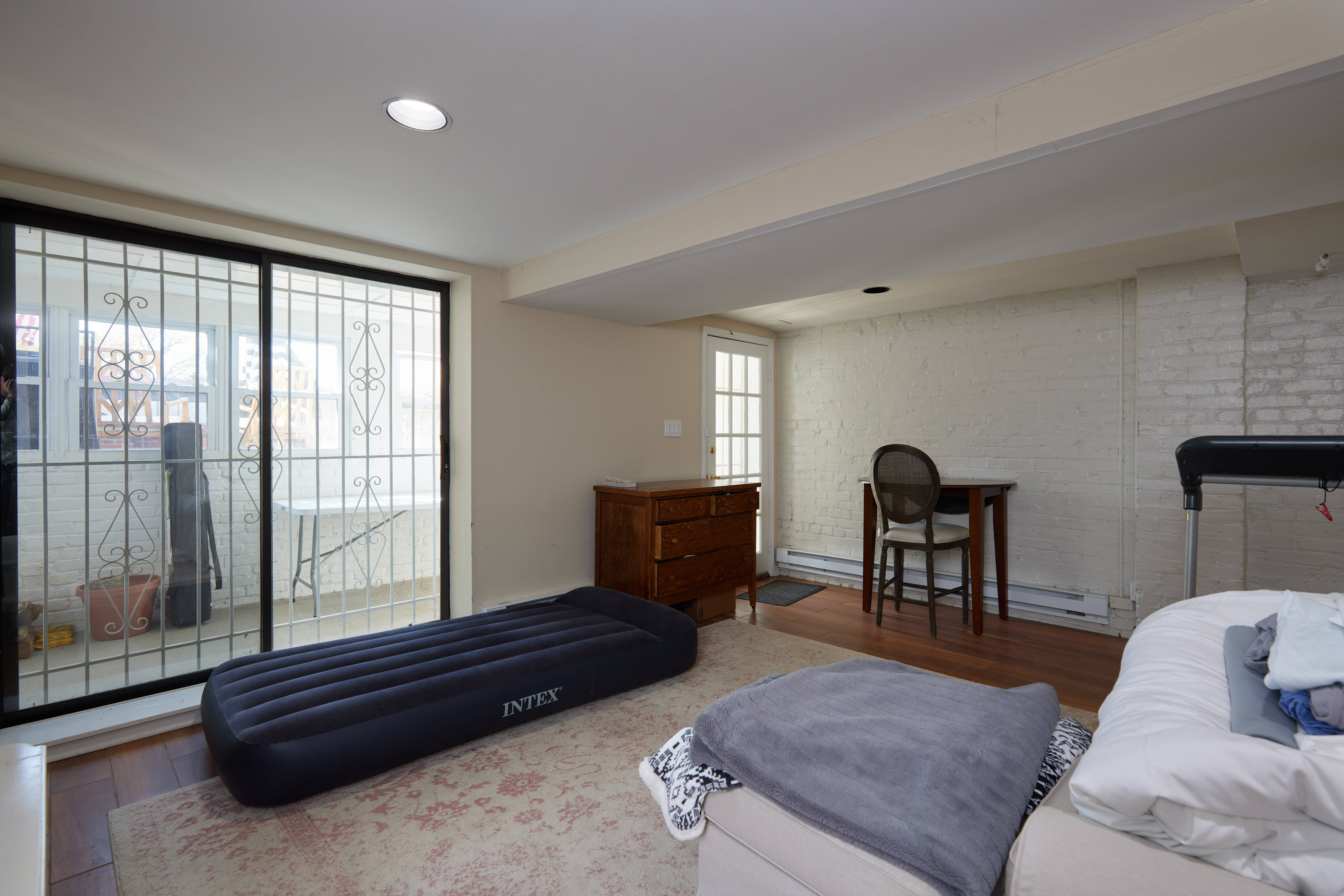 3420 R Street Northwest Washington, DC 20007 - Photo 26 of 53 a living room with furniture and a window