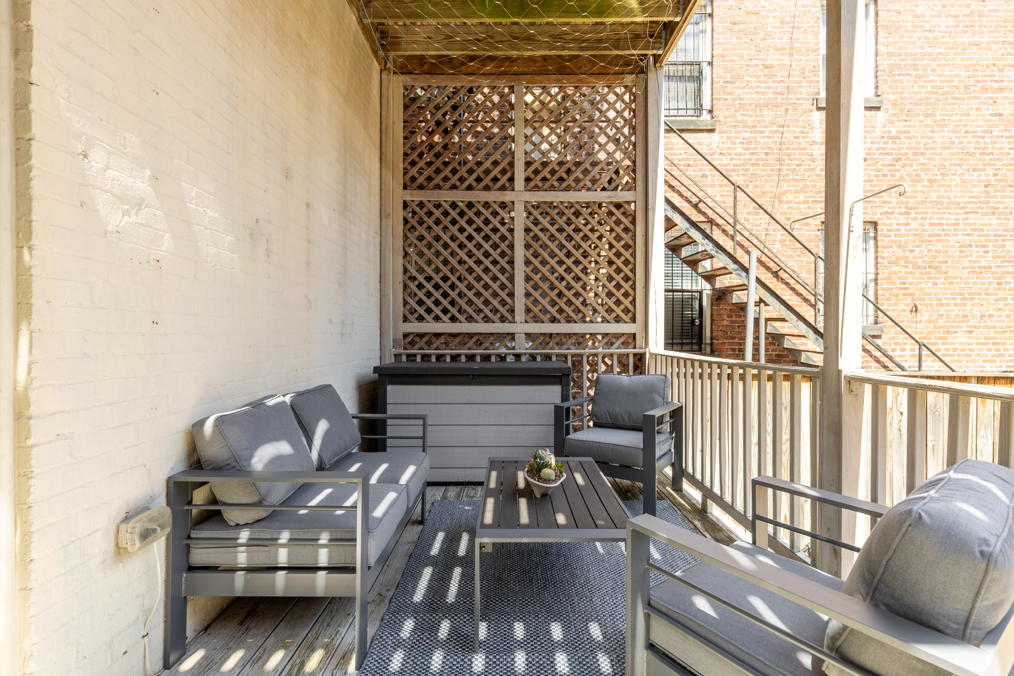 1407 15th Street Northwest, Unit 2 Washington, DC 20005 - Photo 21 of 24 a living room with furniture