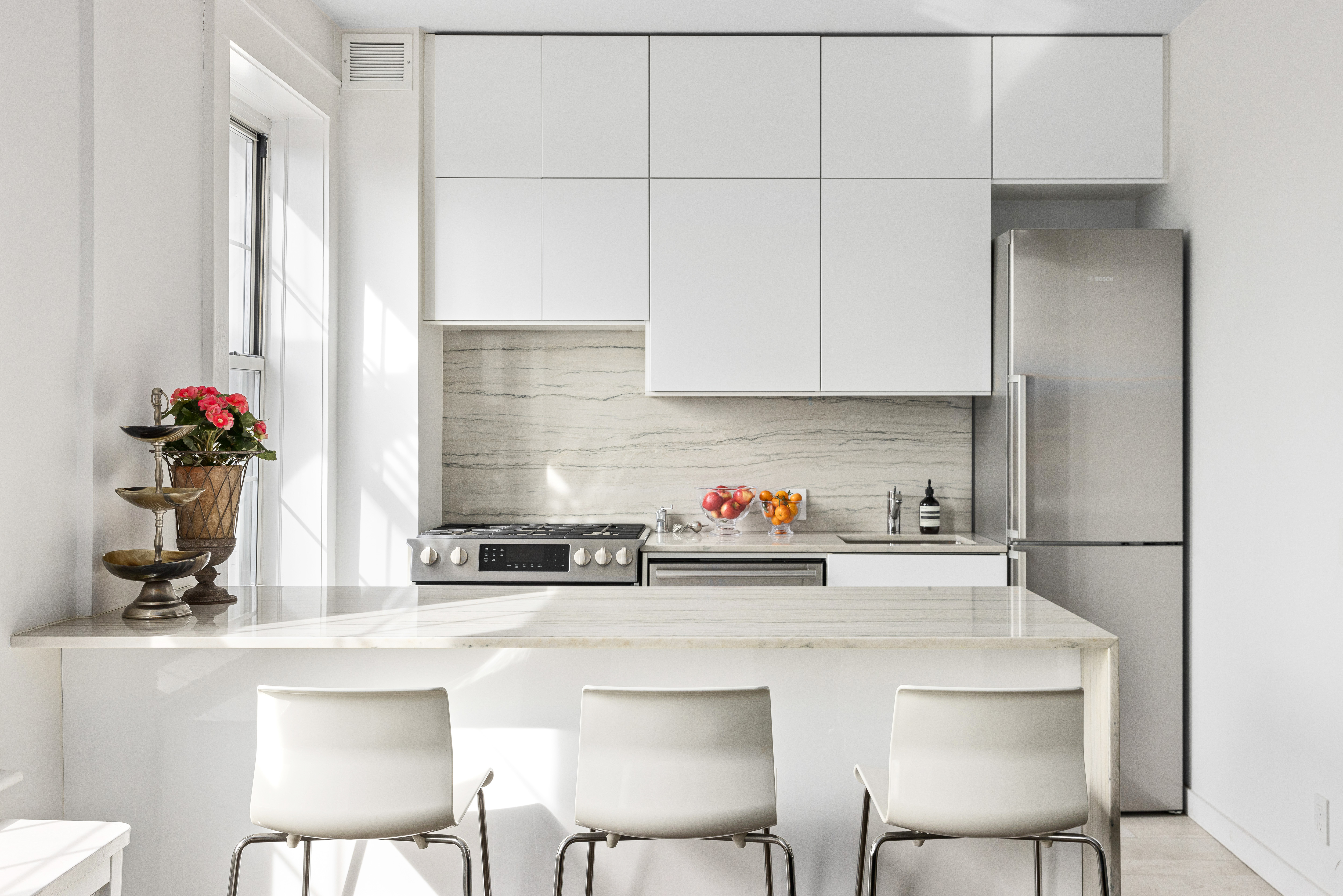 312 Hicks Street, Unit 4 Brooklyn, NY 11201 - Photo 4 of 13 a kitchen with a sink cabinets and window