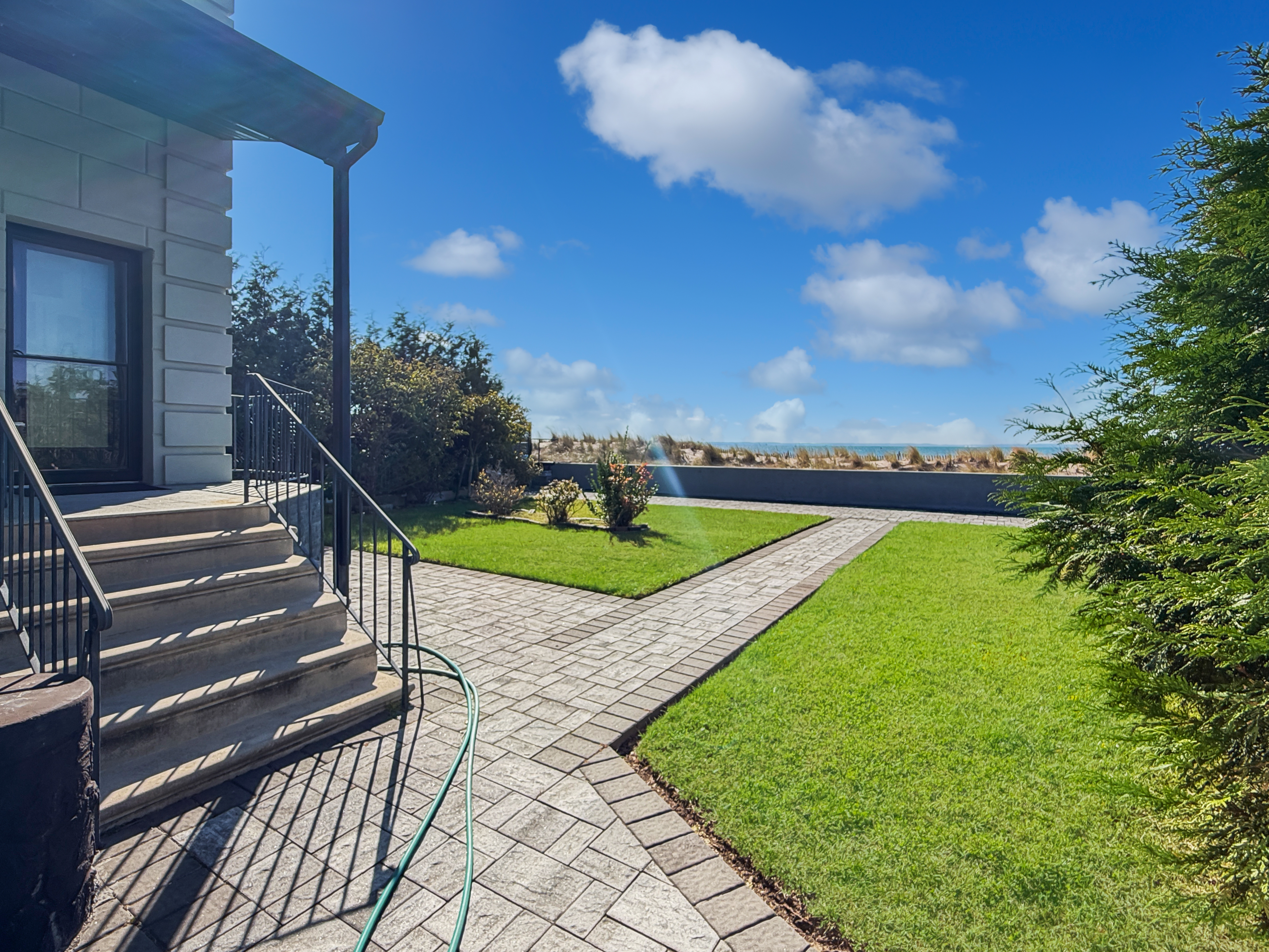 3848 Atlantic Avenue Brooklyn, NY 11224 - Photo 5 of 29 a view of a backyard with sitting area