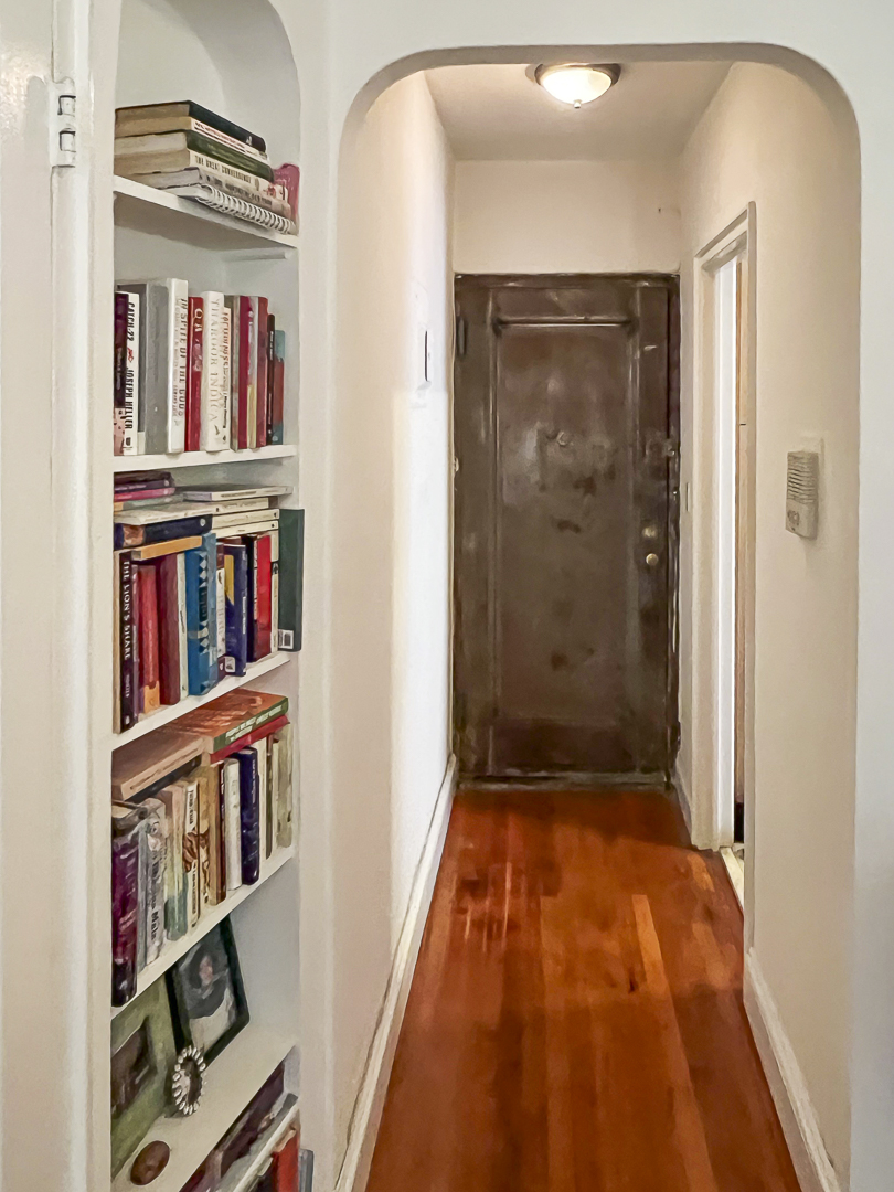 208 East 28th Street, Unit 4A Manhattan, NY 10016 - Photo 8 of 12 a view of walk in closet with clothes and shoes