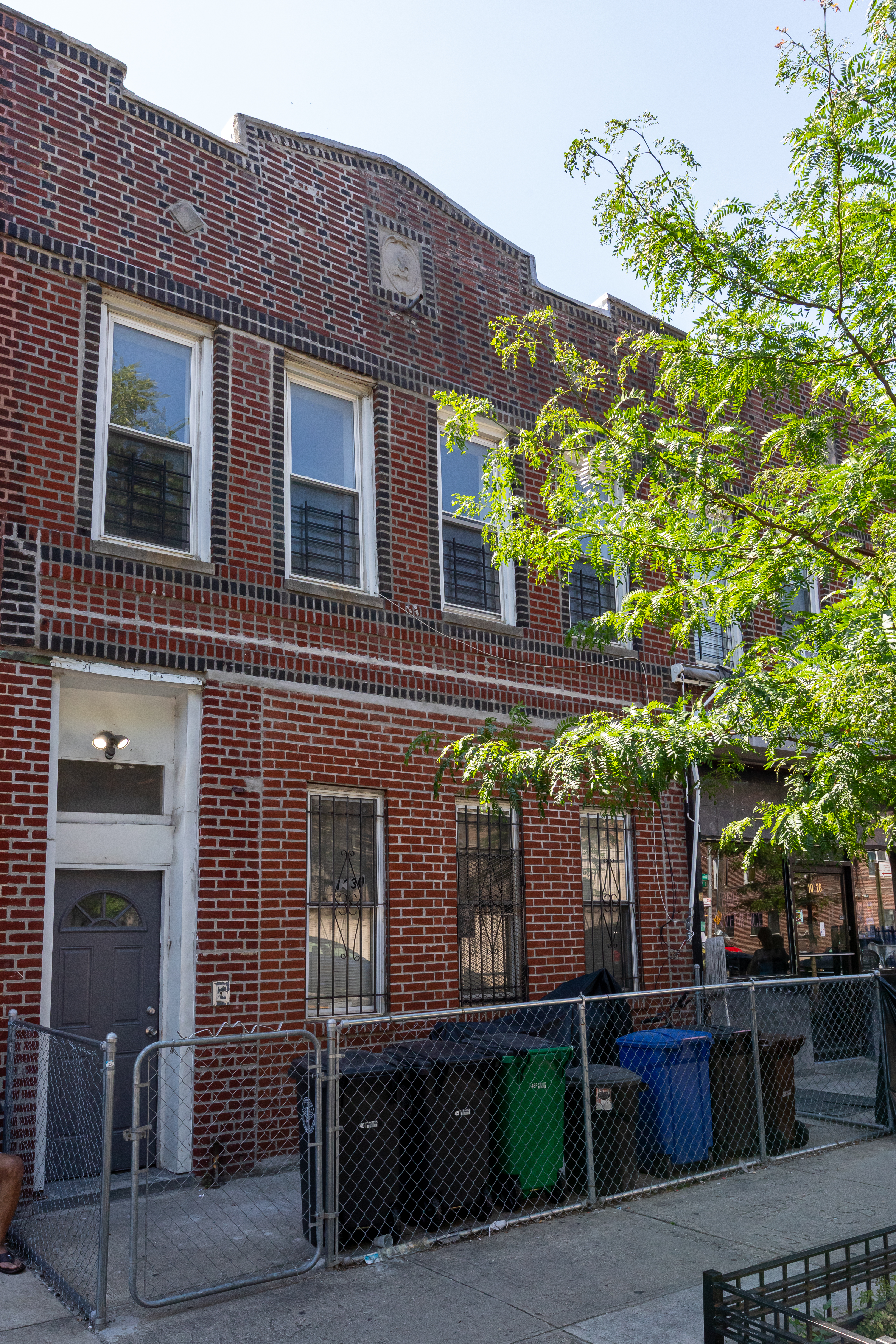 1030 Winthrop Street, Unit 2A Brooklyn, NY 11212 - Photo 10 of 10 a front view of a house with a tree