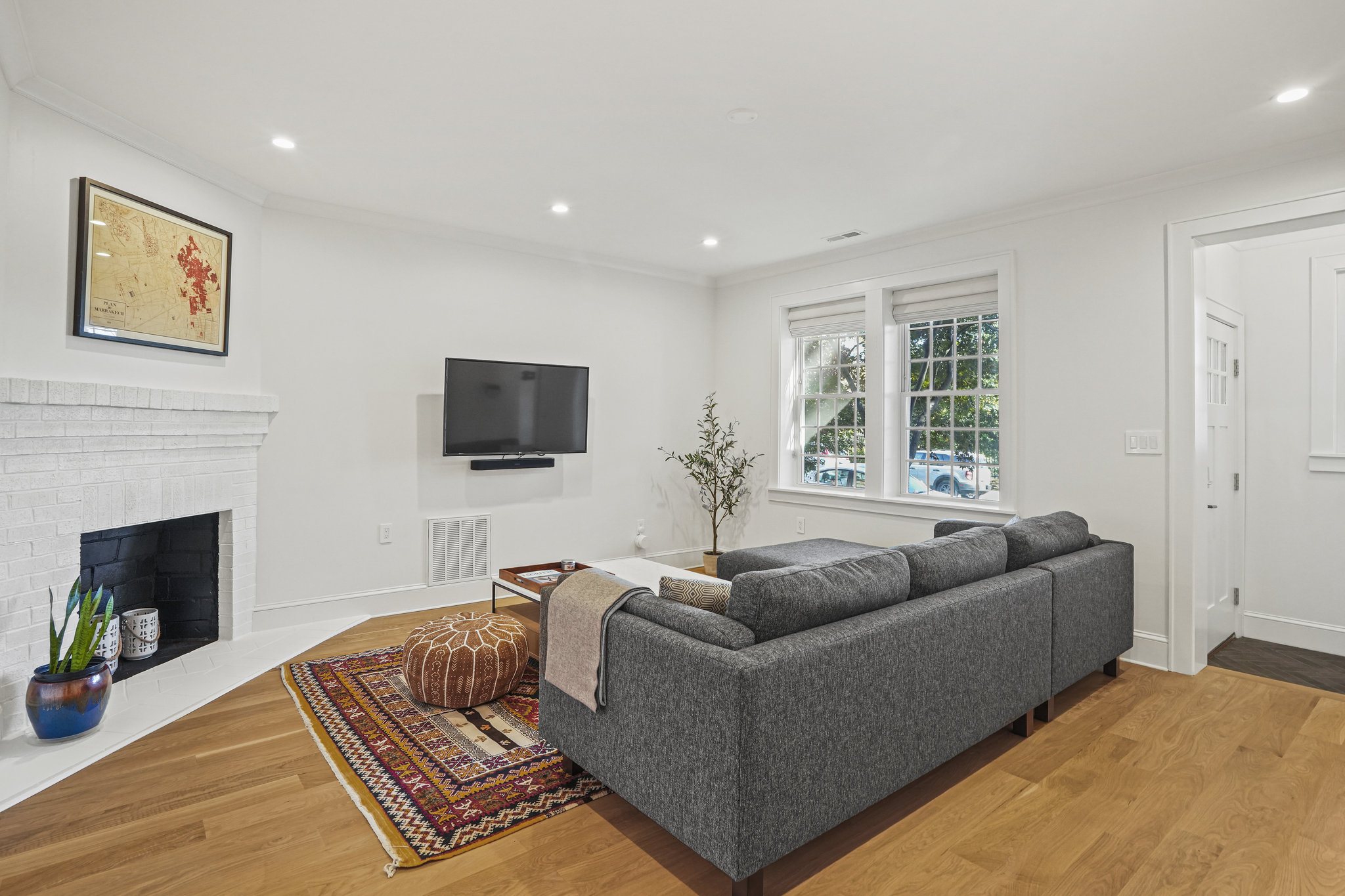 1920 35th Street Northwest Washington, DC 20007 - Photo 10 of 54 a living room with furniture and a flat screen tv