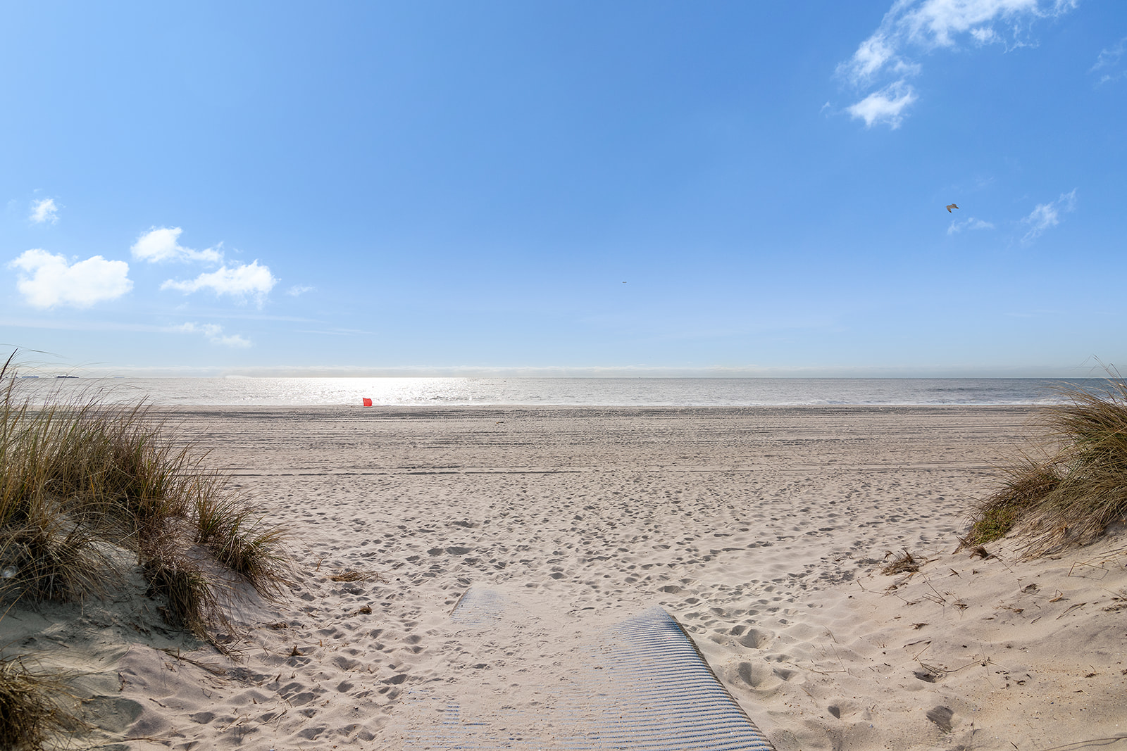 91-16 Shore Front Parkway, Unit 2F Queens, NY 11693 - Photo 8 of 9 a view of ocean view with beach