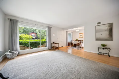 a view of livingroom with furniture and floor to ceiling window