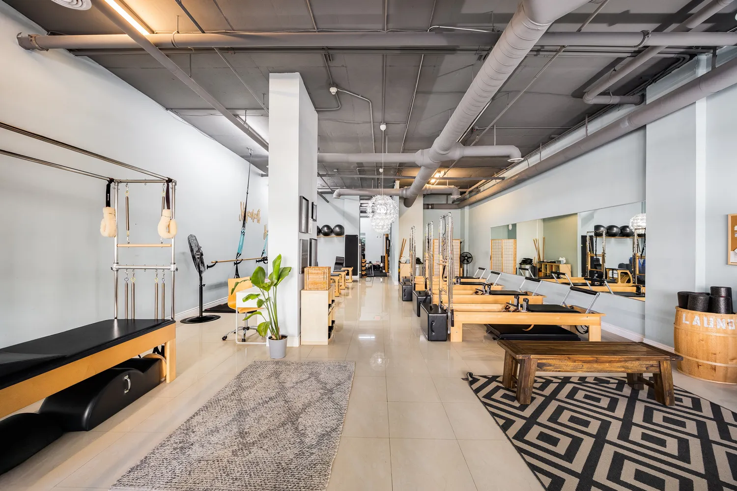 a living room with lots of furniture and a table