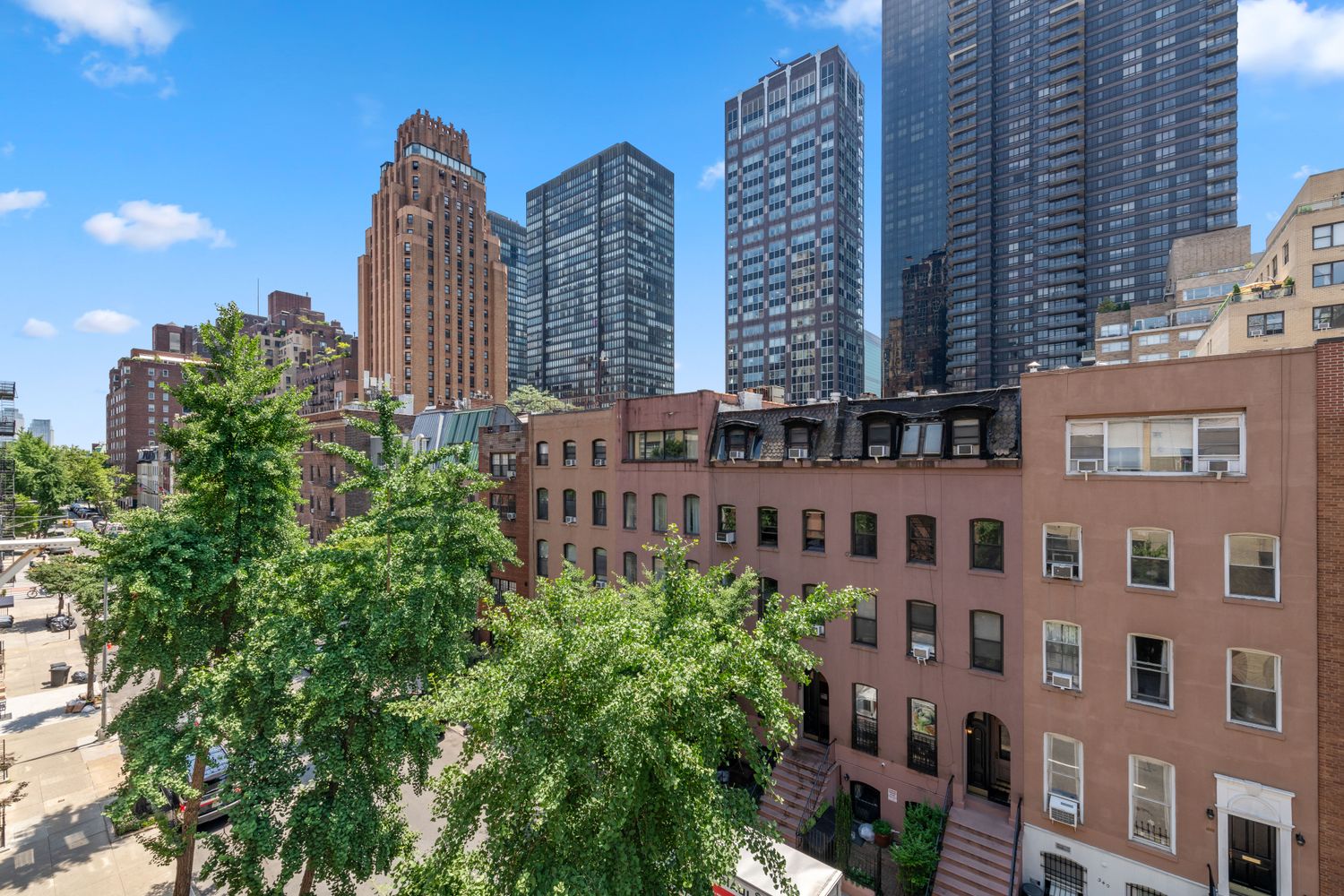 337 East 50th Street, Unit PH-E Manhattan, NY 10022 - Photo 5 of 7 a view of a city with tall buildings