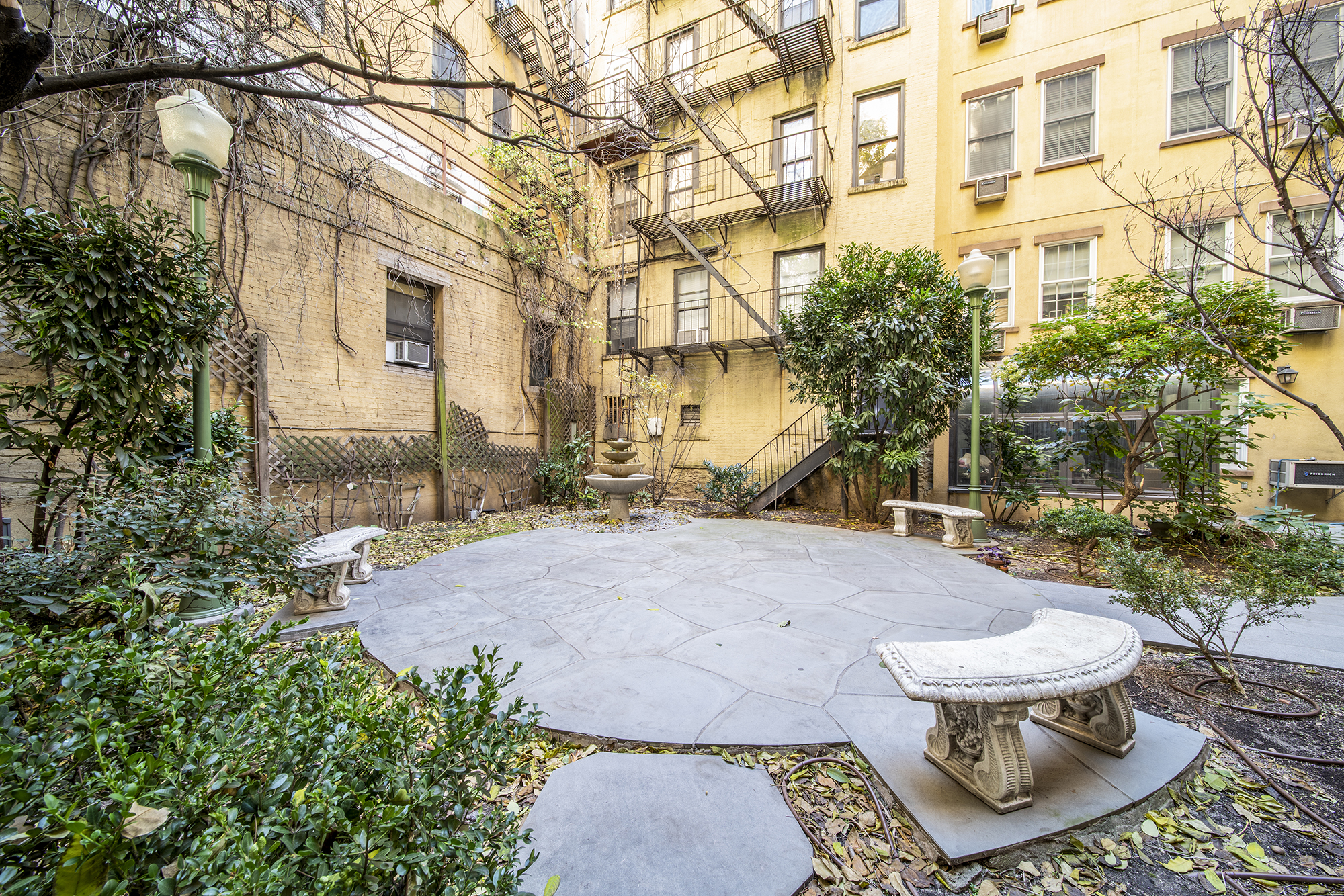 407 East 12th Street, Unit 1RSE Manhattan, NY 10009 - Photo 12 of 13 a view of a patio with iron fence
