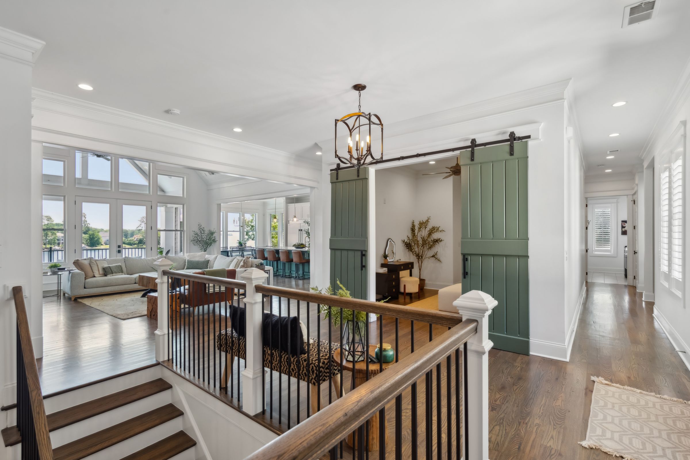 249 Pointe Overlook Drive Chapin, SC 29036 - Photo 18 of 56 a view of a hallway view with wooden floor and staircase