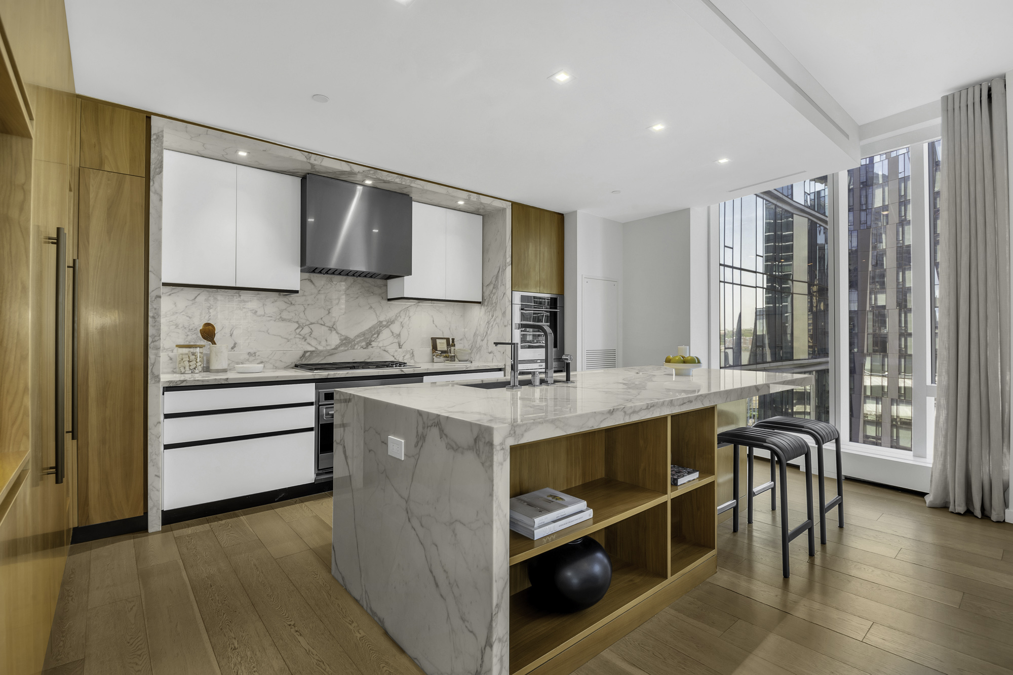 1 West End Avenue, Unit 10A Manhattan, NY 10023 - Photo 6 of 38 a kitchen with a stove a sink and a refrigerator